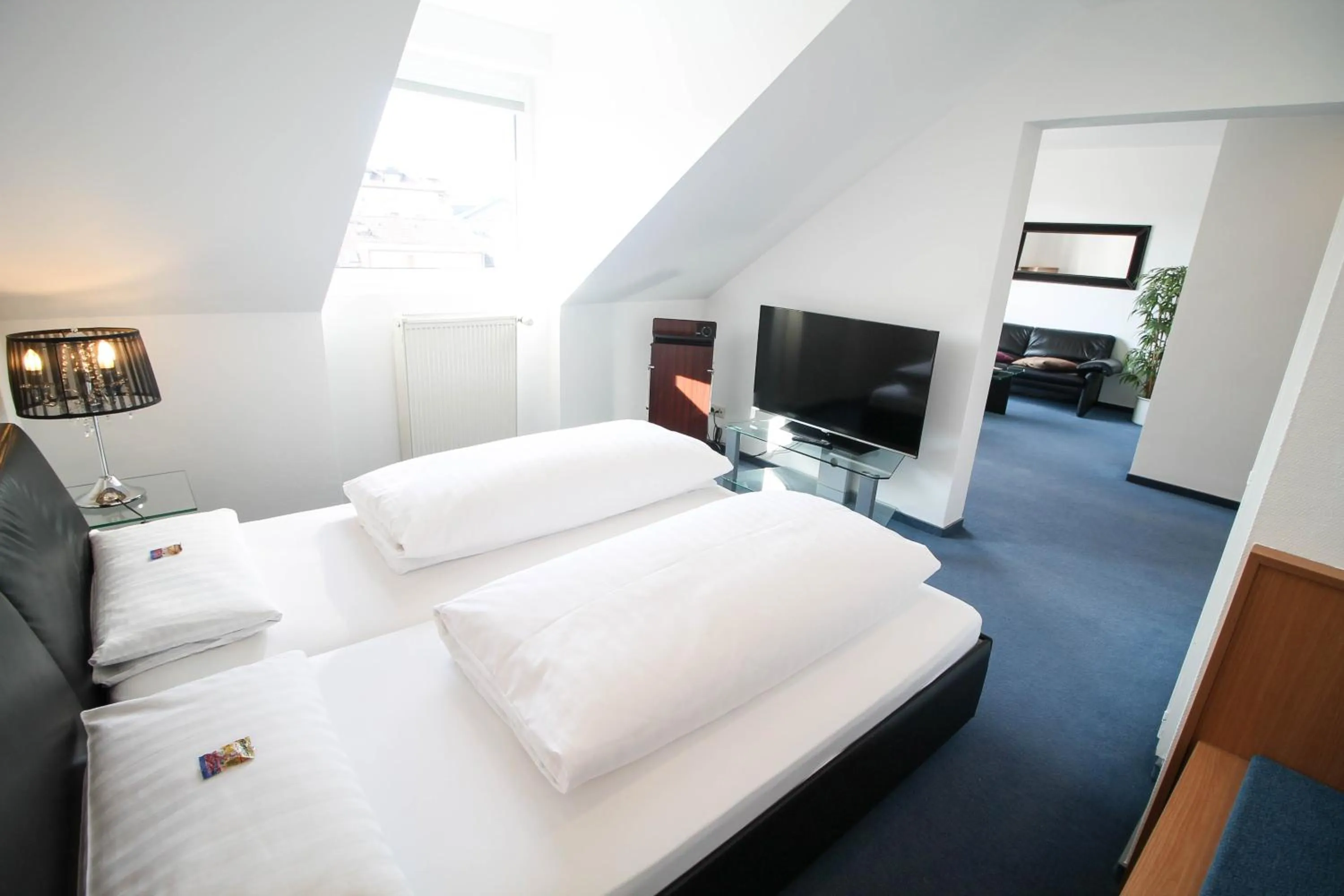 Photo of the whole room, Bed in Hotel am Zoo