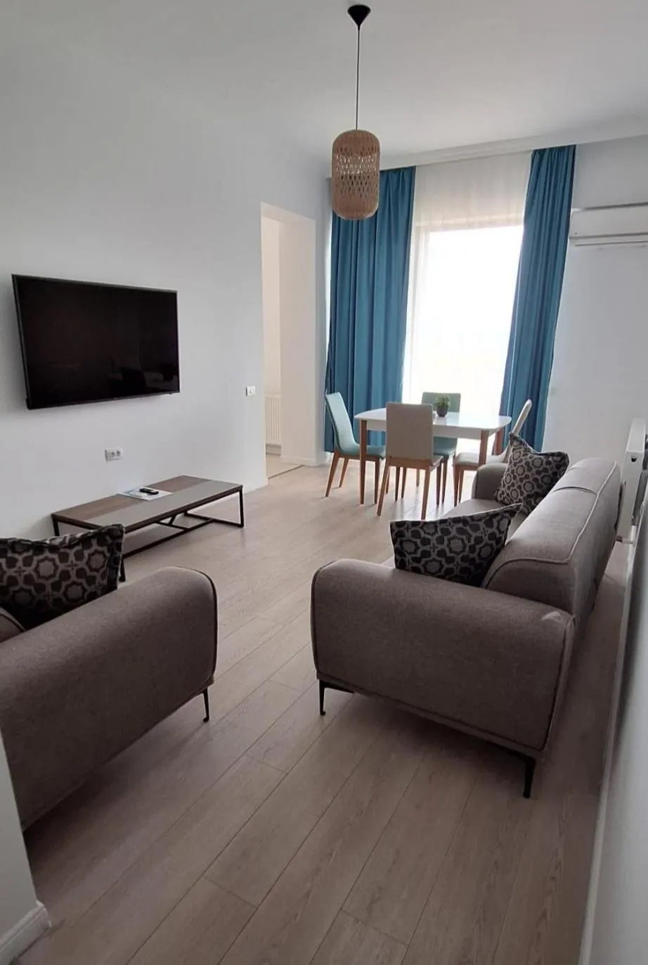 Communal lounge/ TV room in Solid Magic Apart Hotel