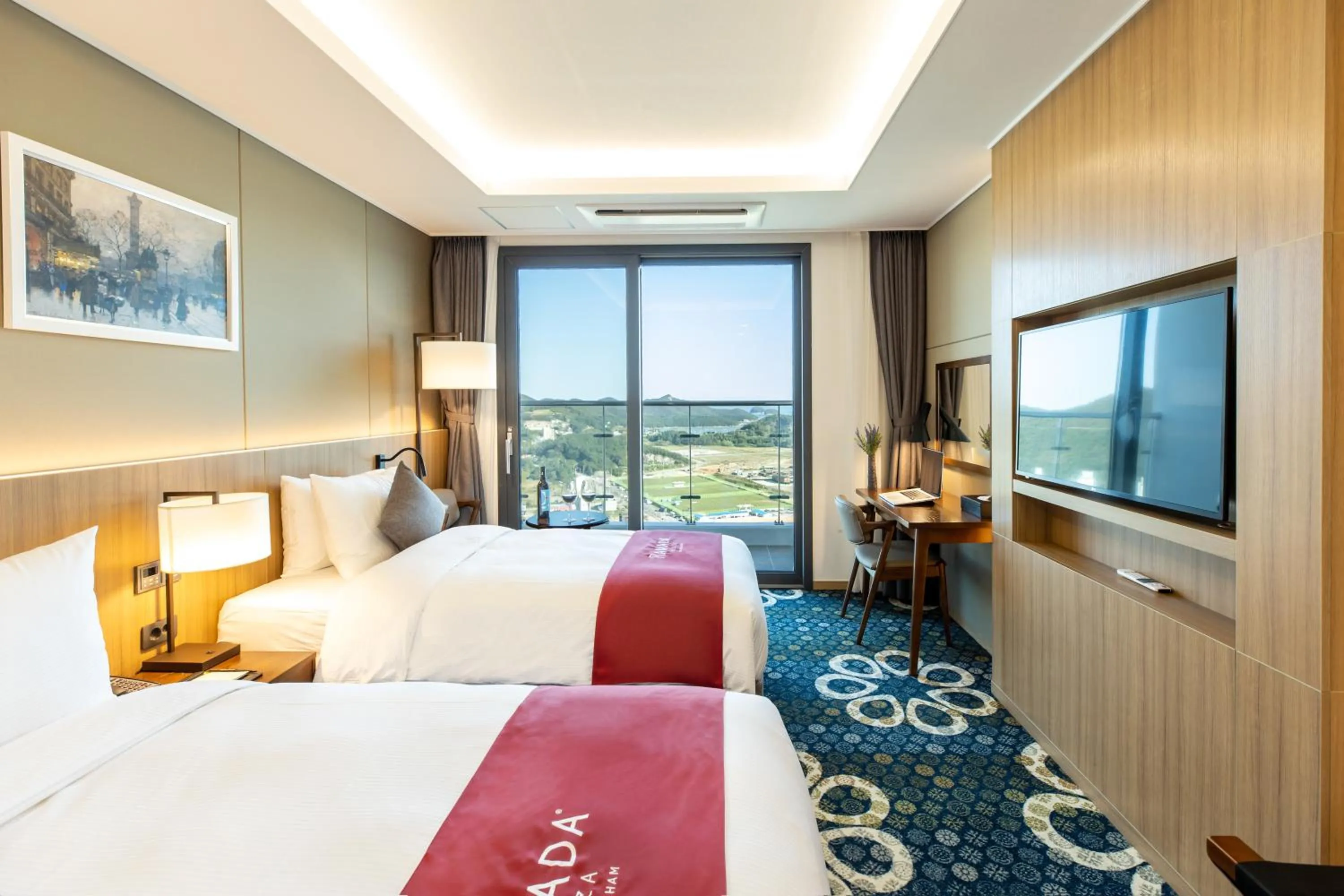 Photo of the whole room, Bed in Ramada Plaza by Wyndham Dolsan Yeosu