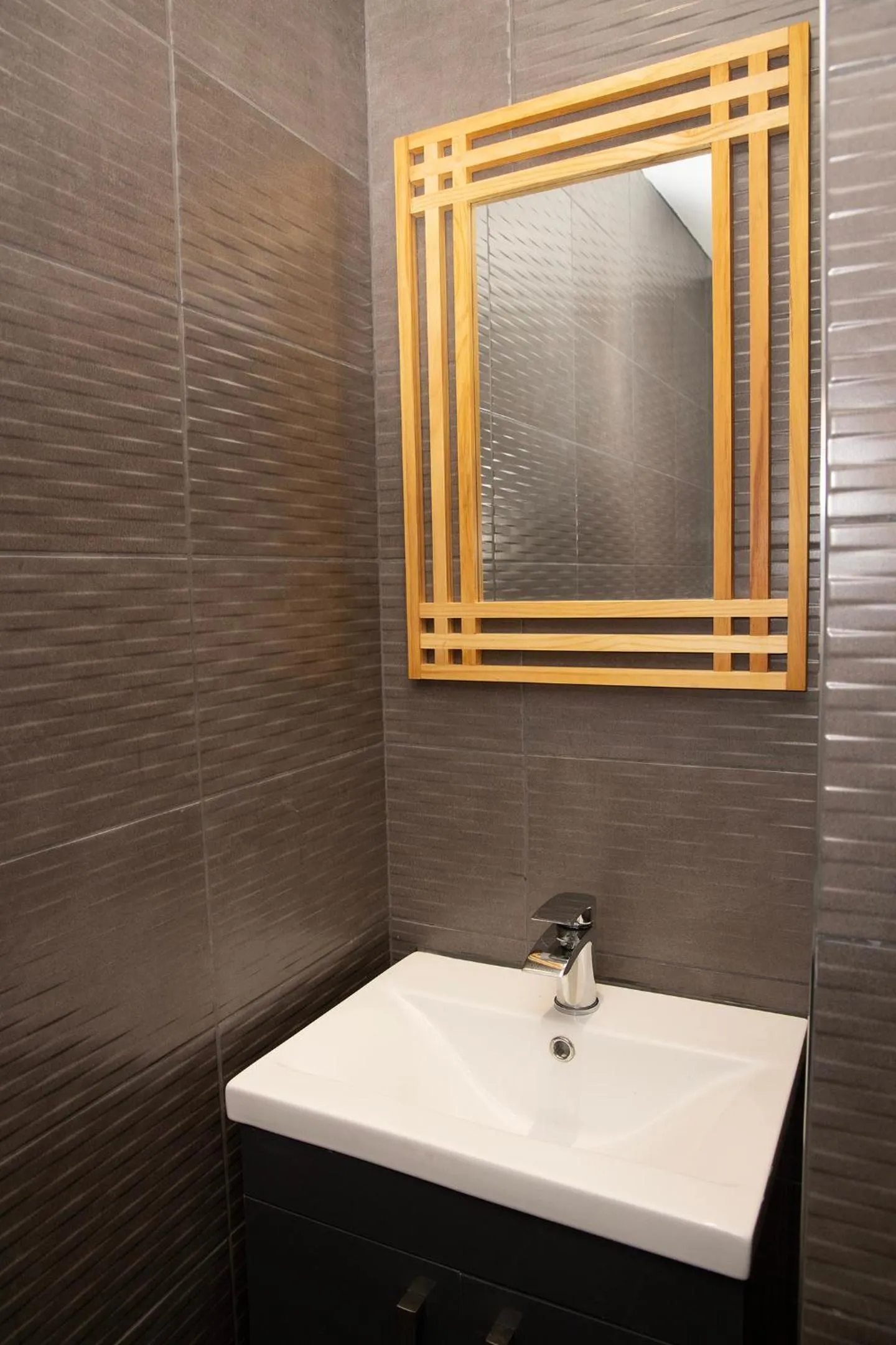 Bathroom in Lord Street Apartments By Happy Days