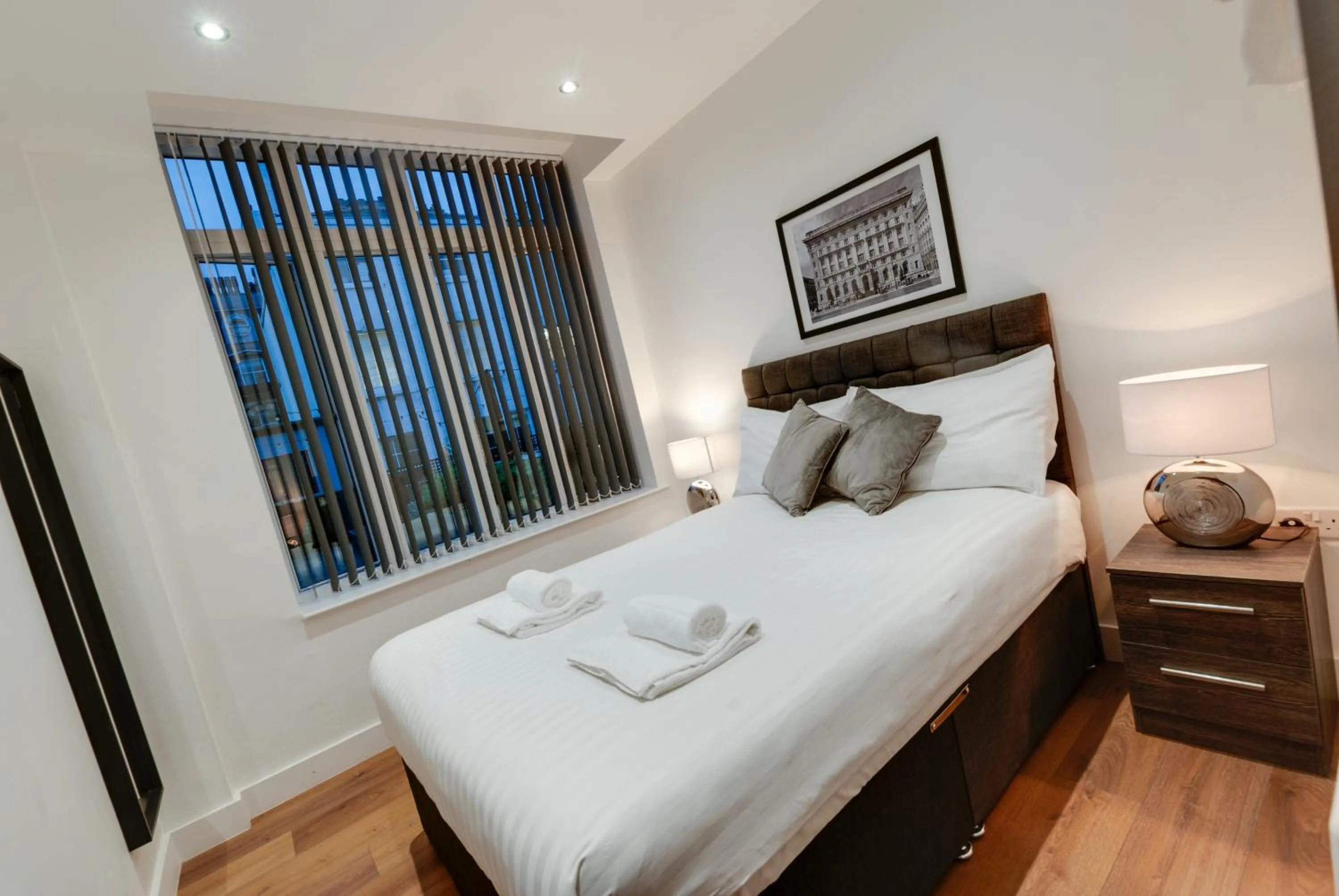 Bed in Lord Street Apartments By Happy Days