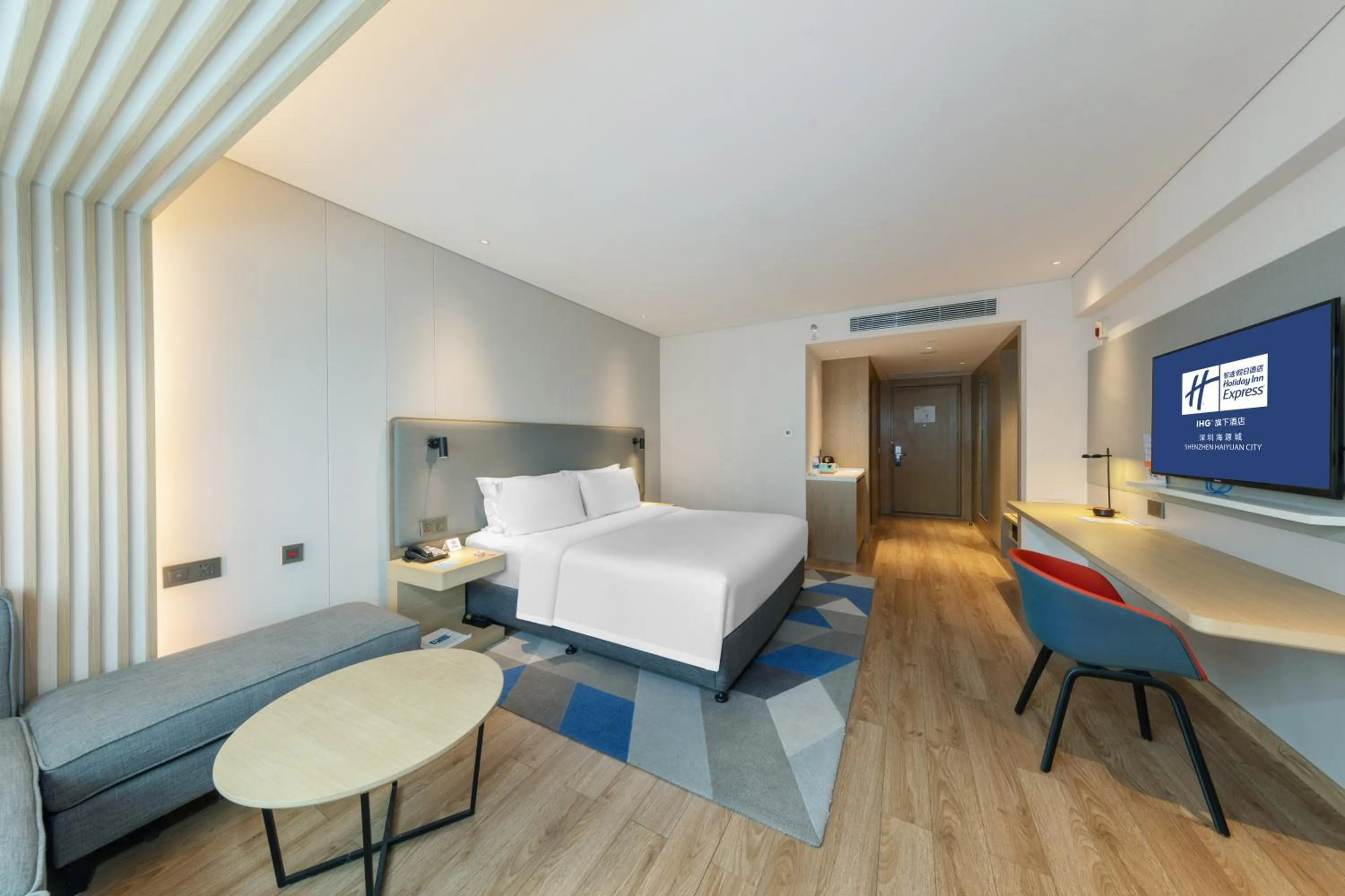 Bed in Holiday Inn Express Shenzhen Haiyuan City by IHG