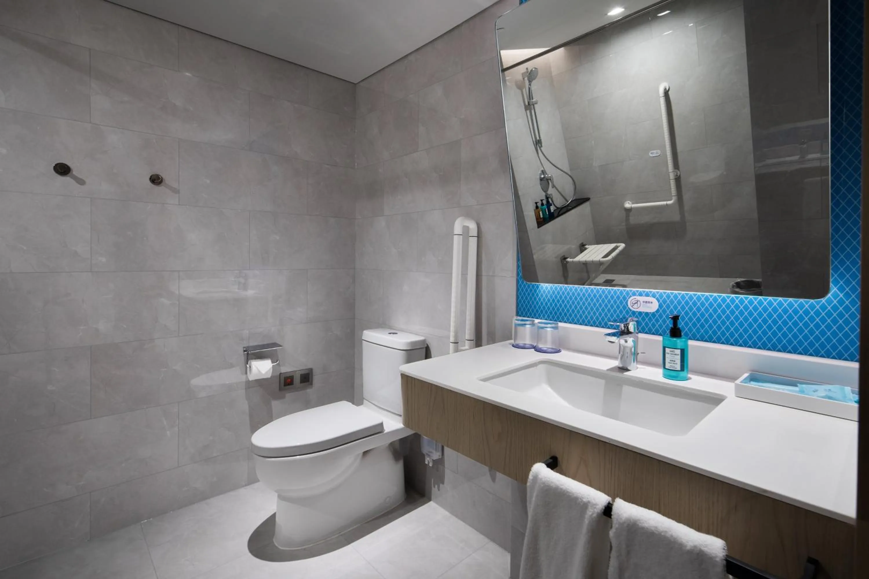 Bathroom in Holiday Inn Express Shenzhen Haiyuan City by IHG