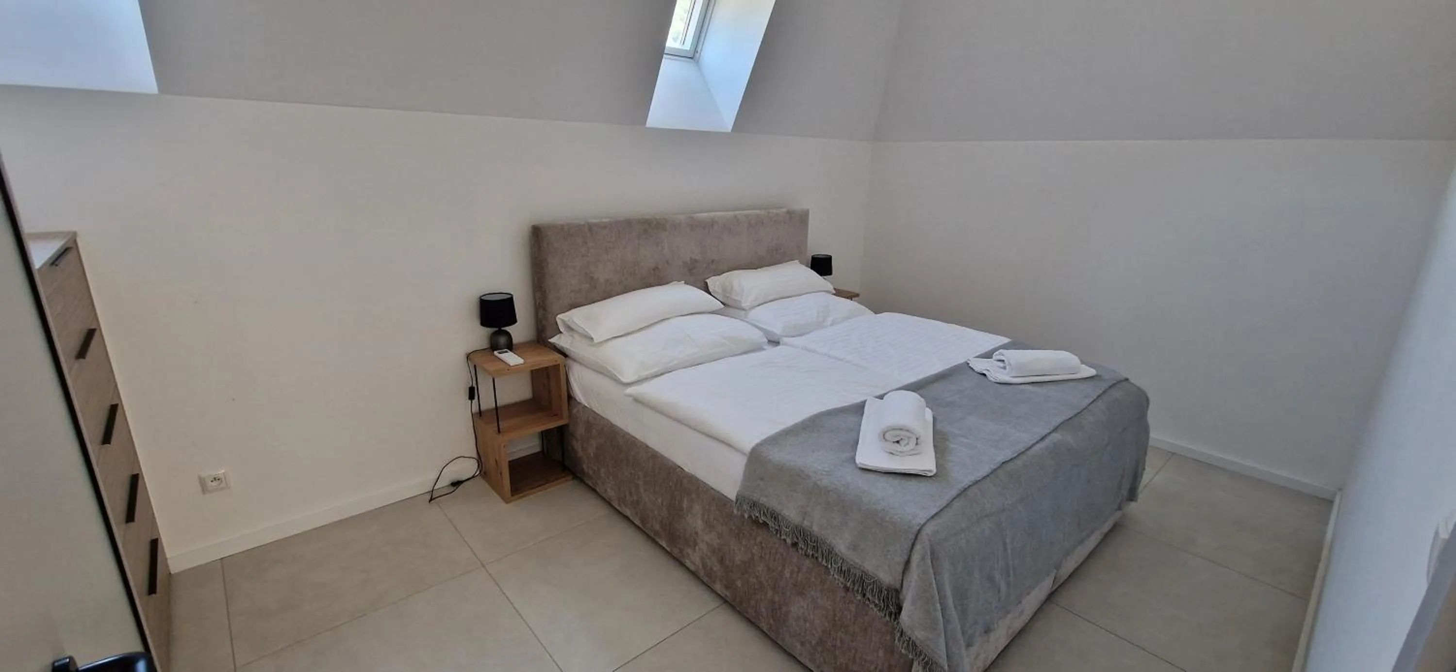 Photo of the whole room, Bed in Apartmánový dom GRAND - Contactless Check In