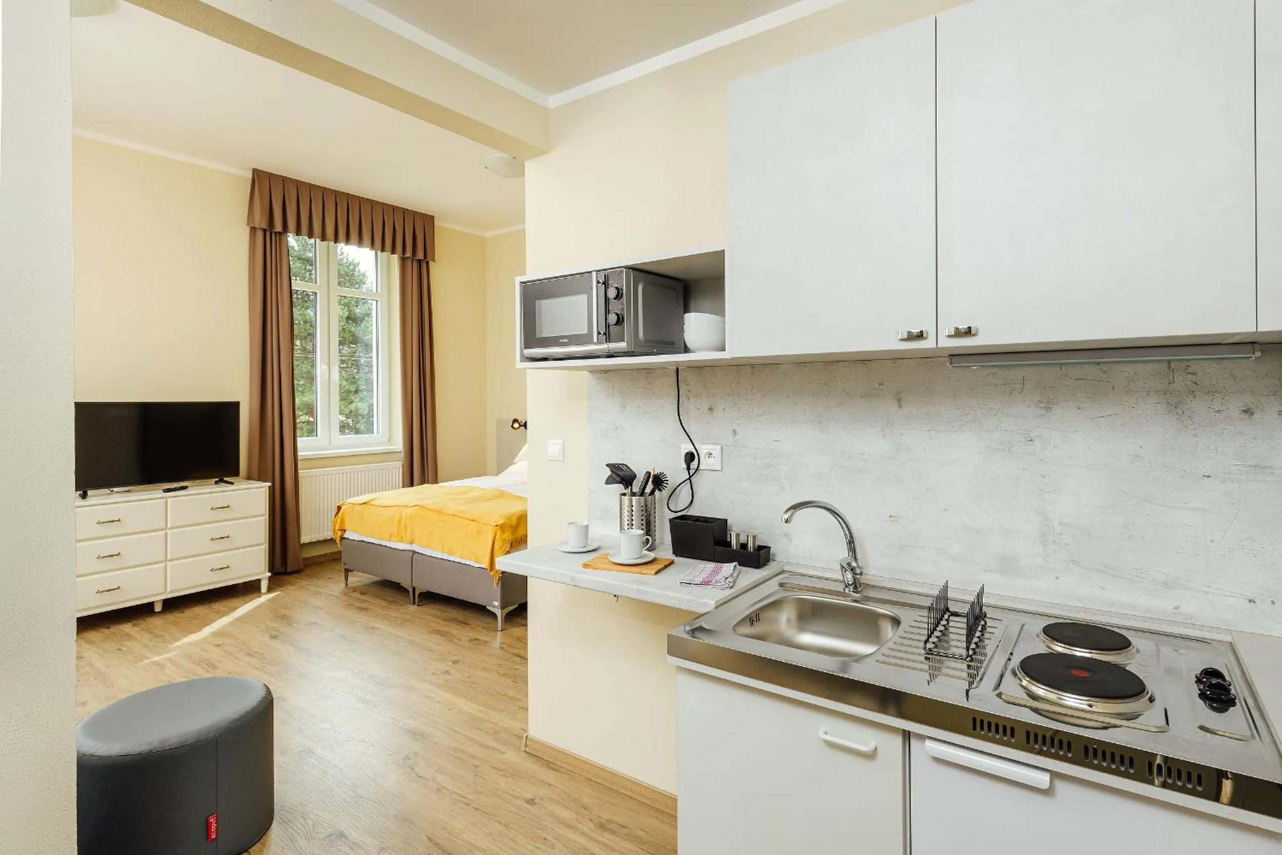 Kitchen or kitchenette, Bed in Apartmánový dom GRAND - Contactless Check In