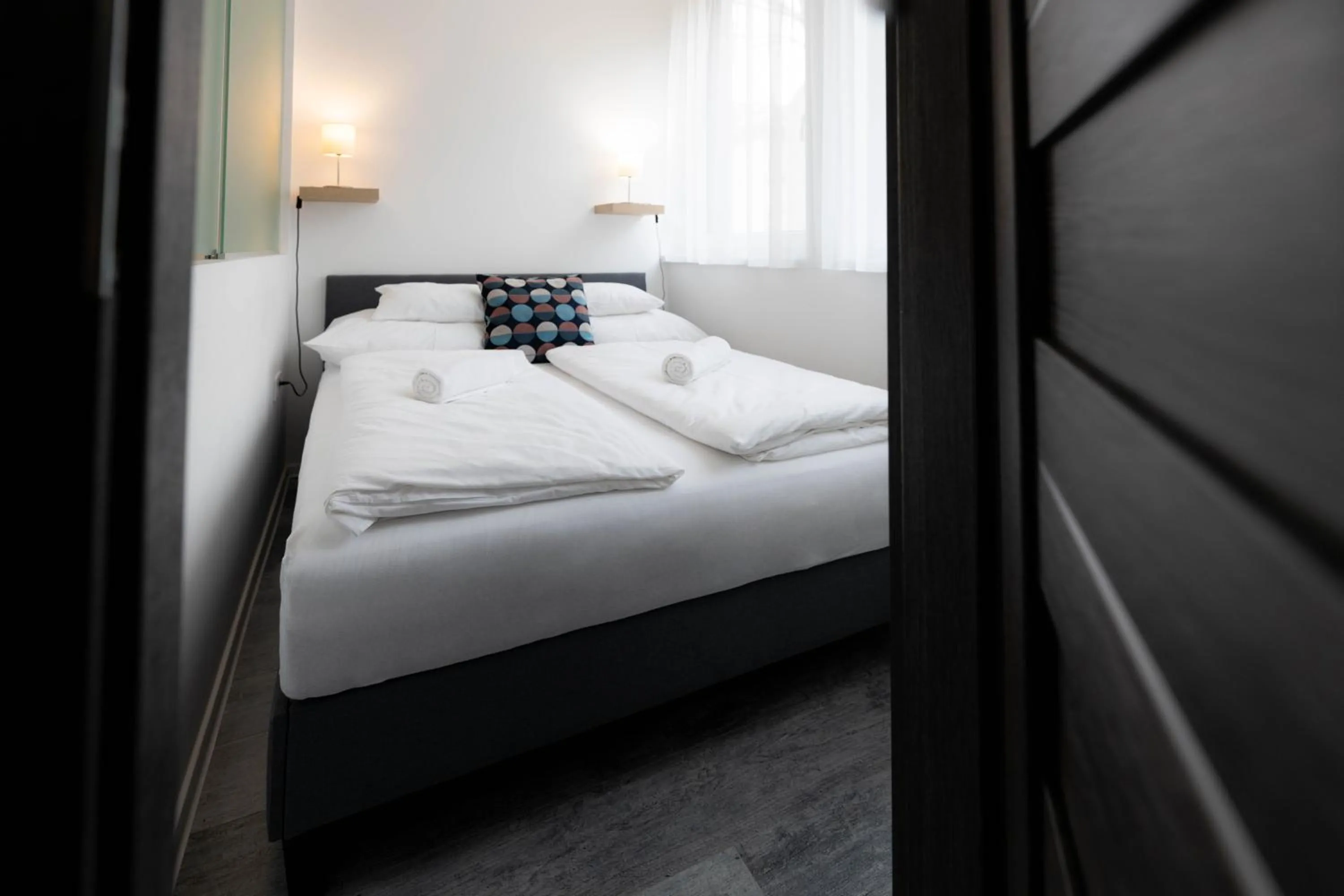 Bedroom, Bed in Roomstore Studio Apartments