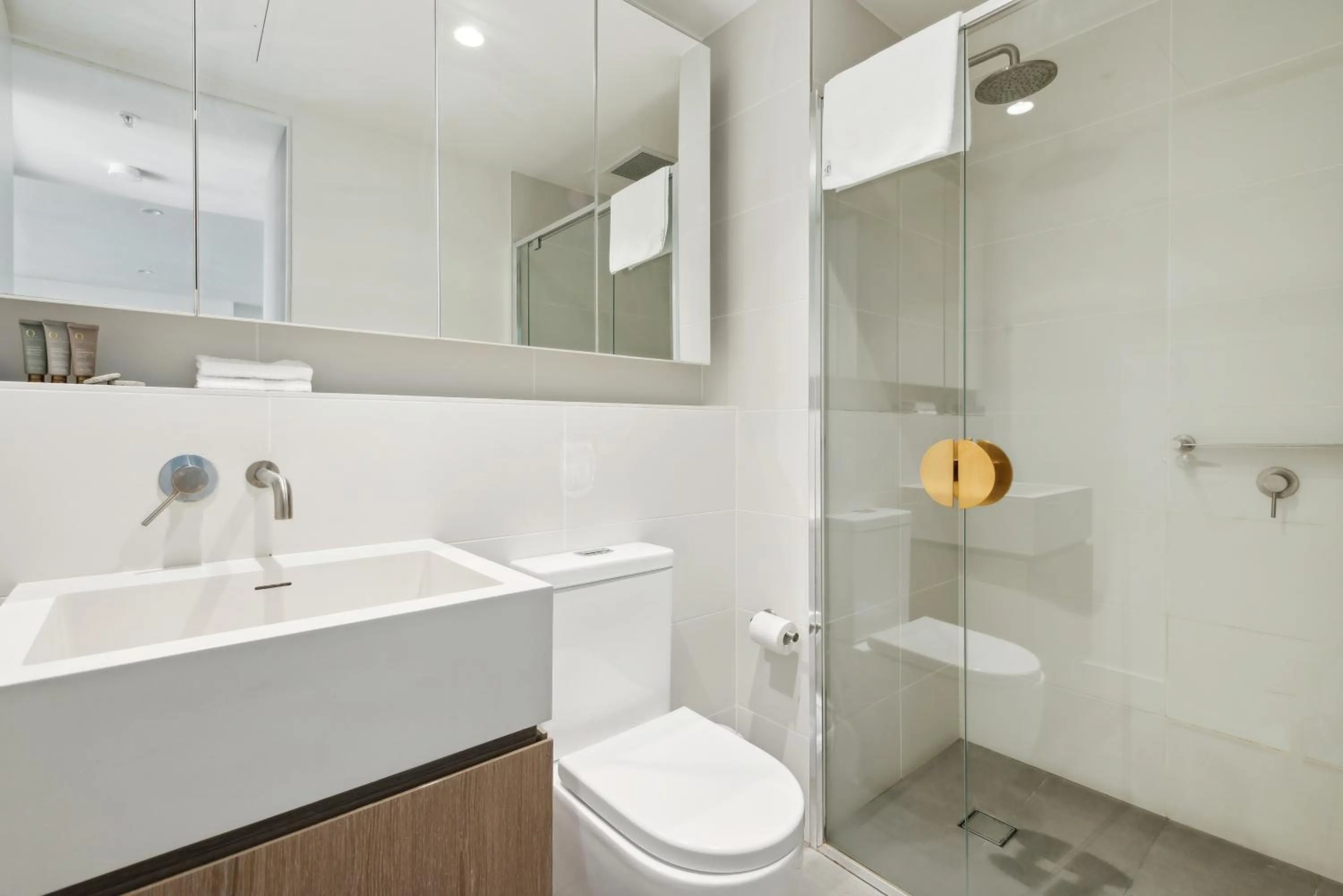 Shower in Realm Apartments by CLLIX