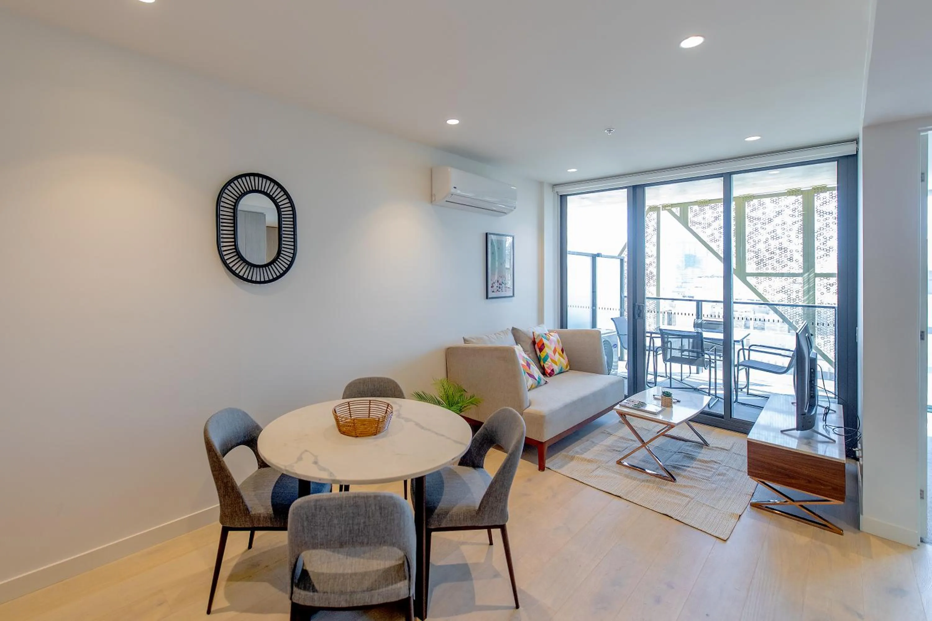 Living room in Realm Apartments by CLLIX