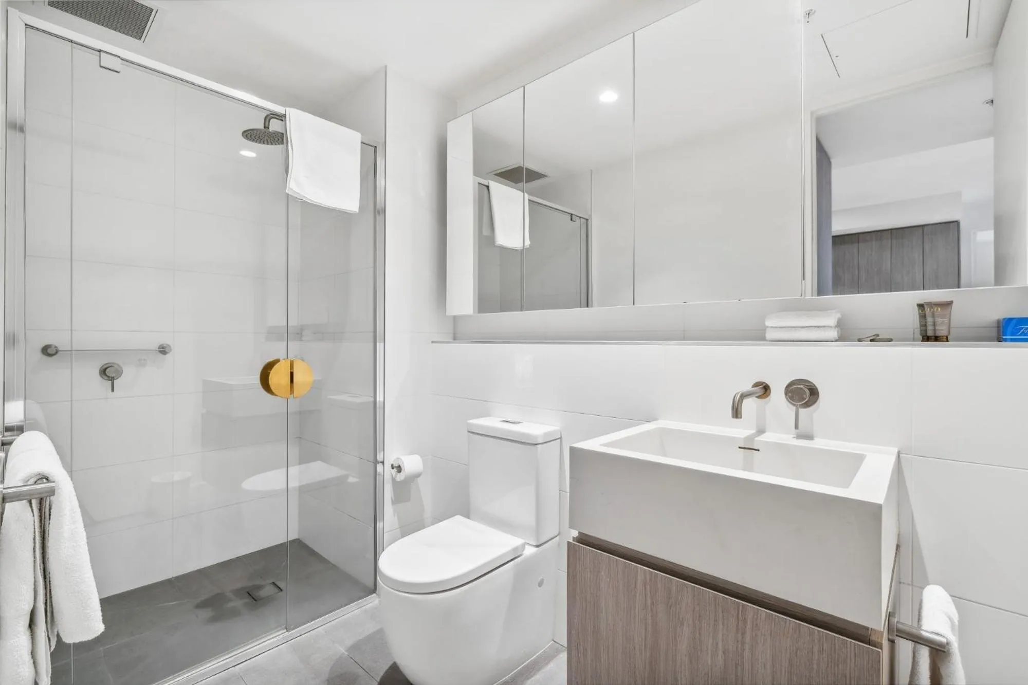 Shower in Realm Apartments by CLLIX