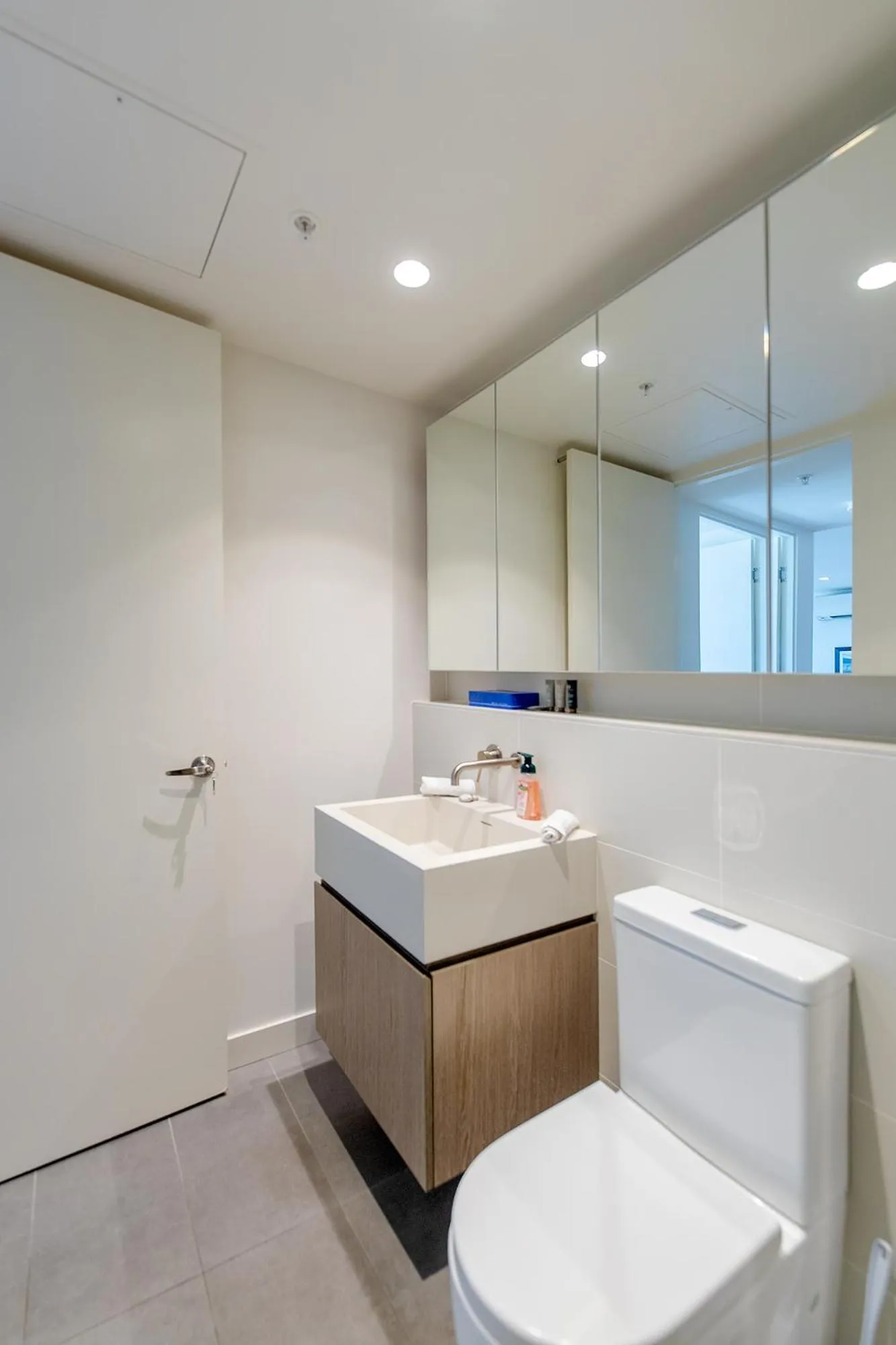 Bathroom in Realm Apartments by CLLIX