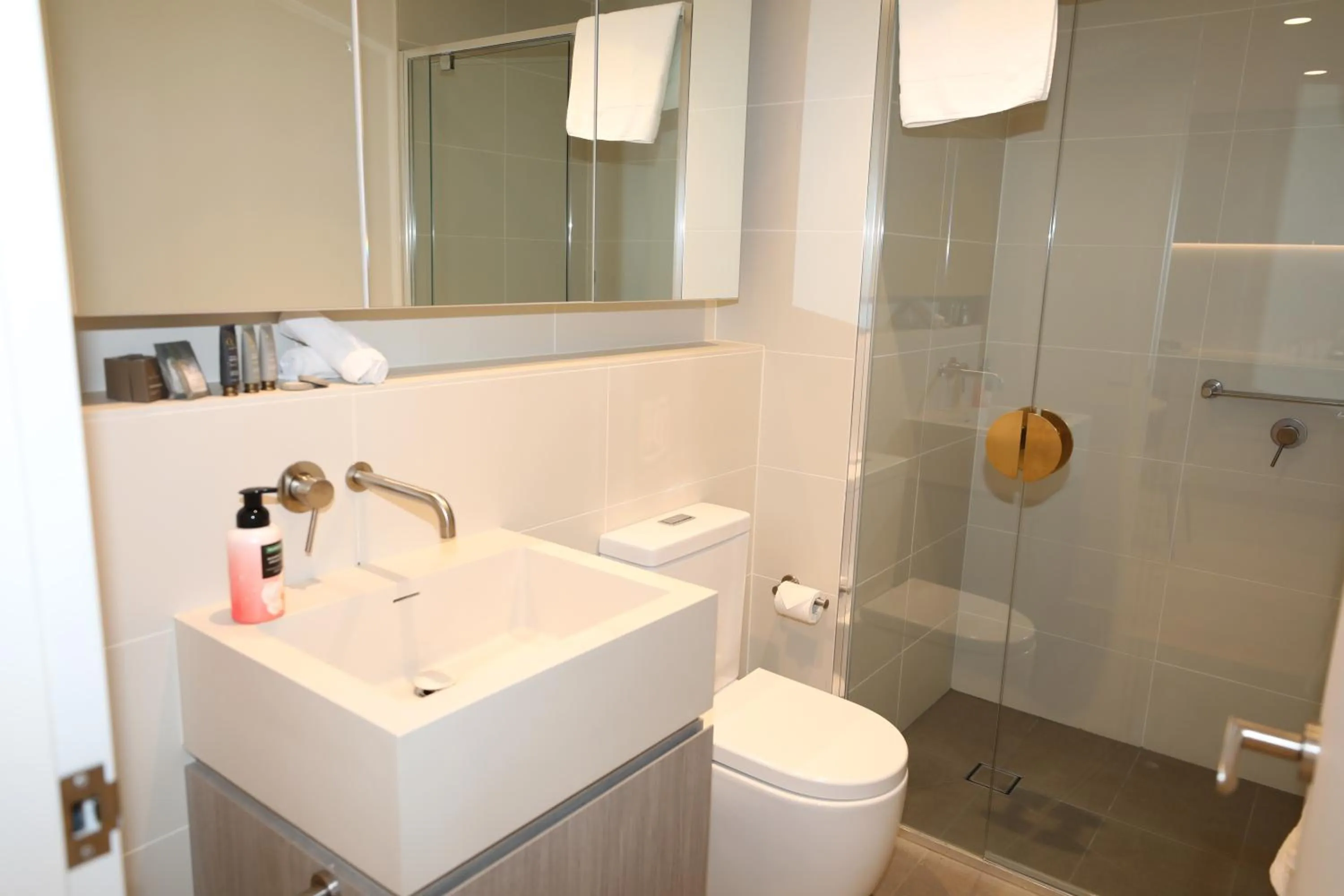 Shower in Realm Apartments by CLLIX