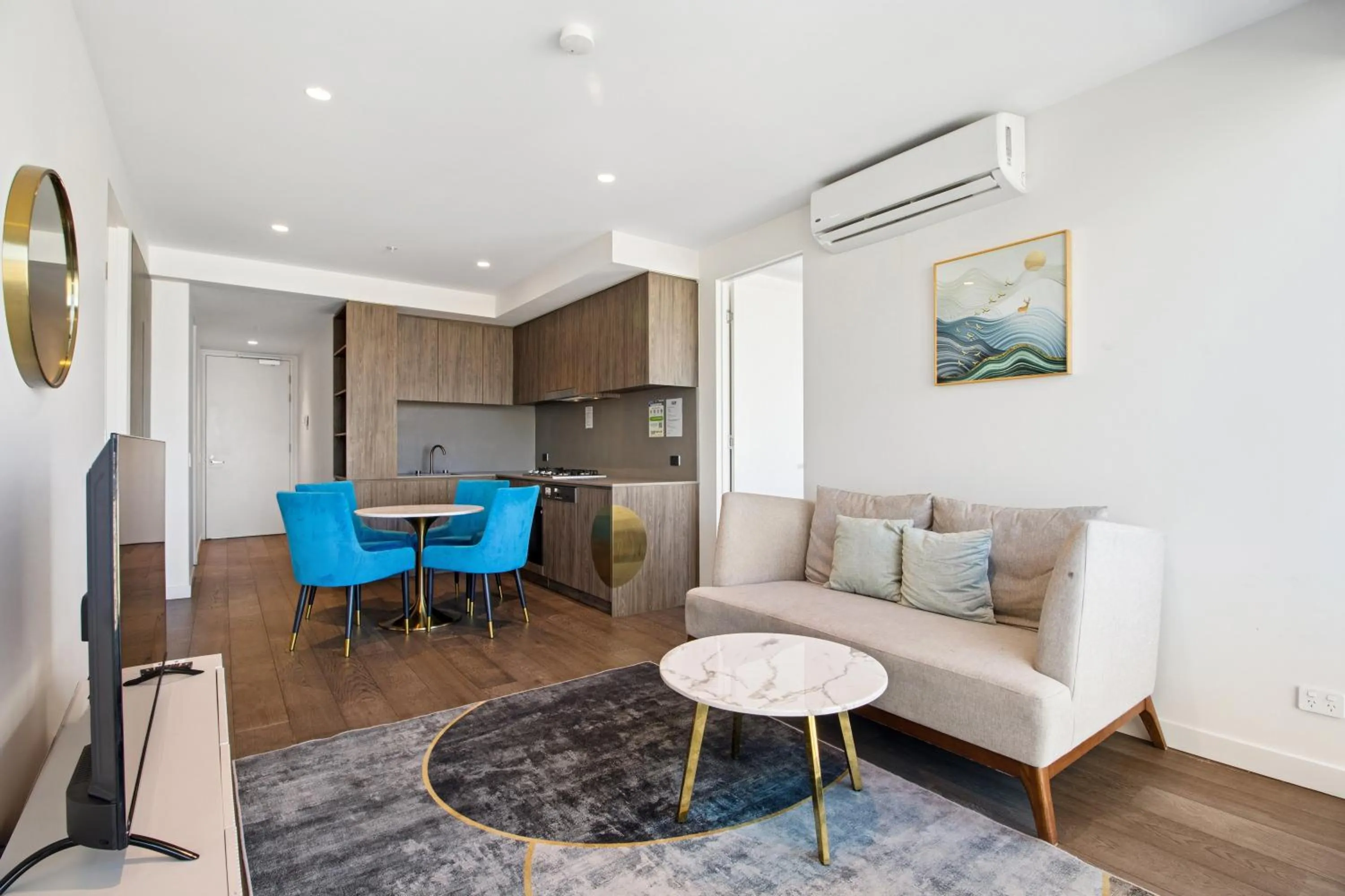 Living room in Realm Apartments by CLLIX