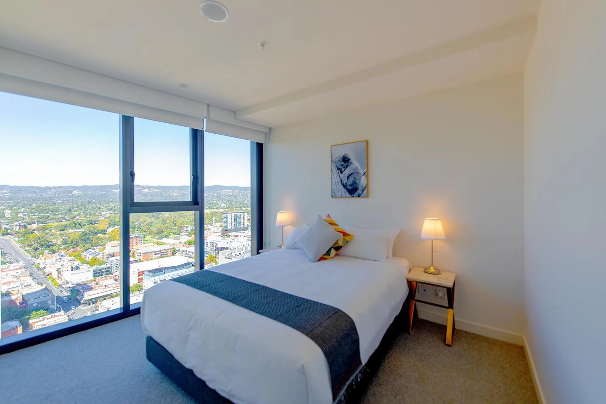 Bed in Realm Apartments by CLLIX