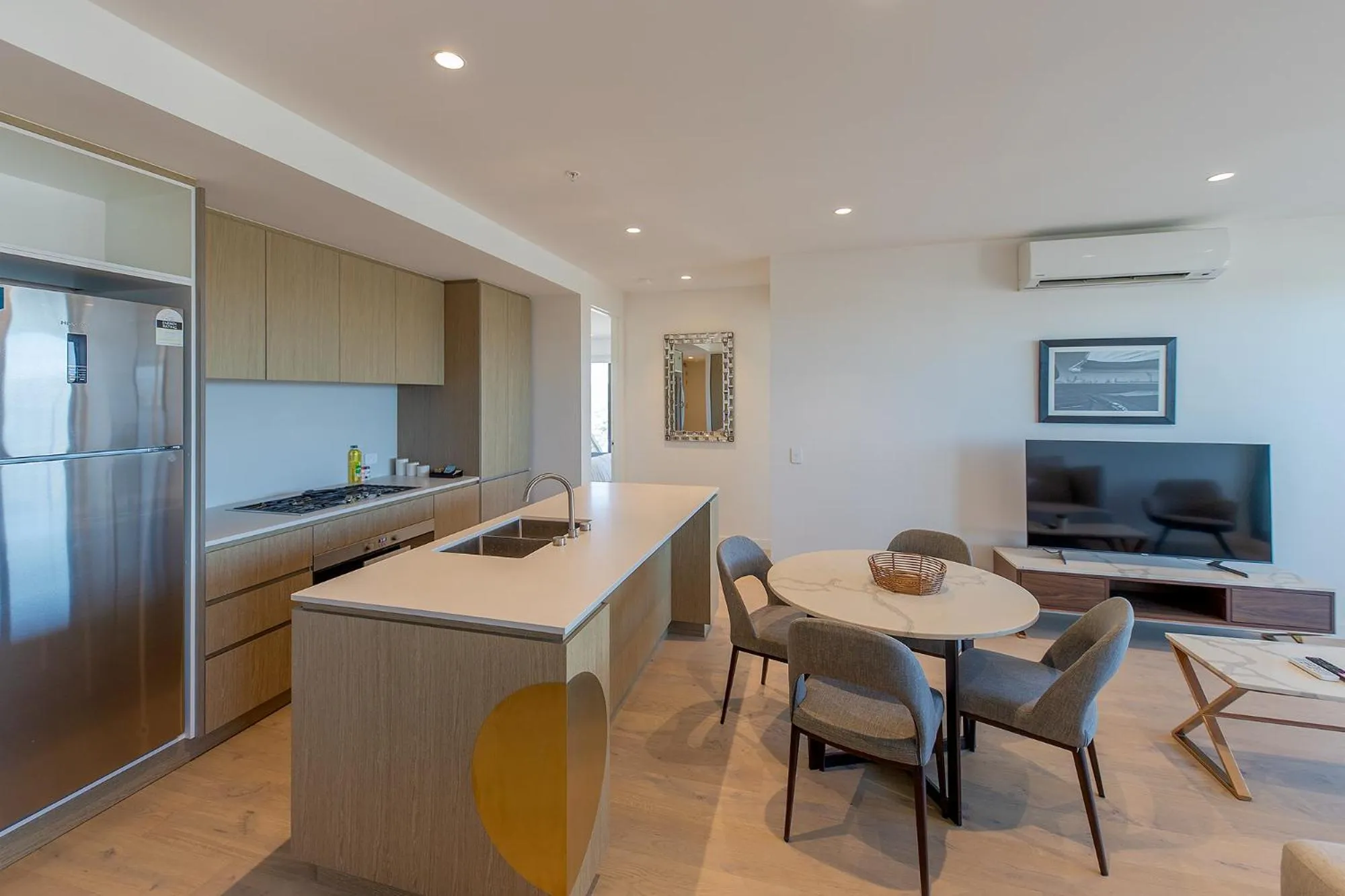 Kitchen or kitchenette in Realm Apartments by CLLIX