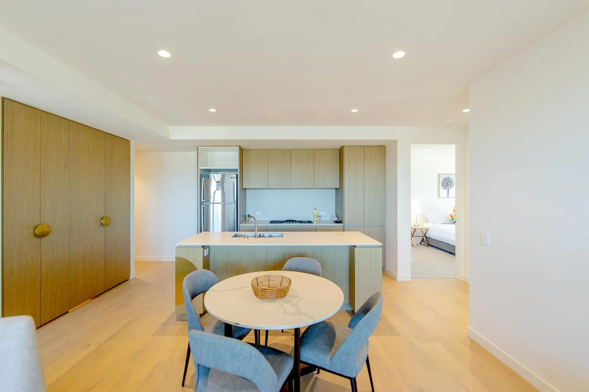 Dining area in Realm Apartments by CLLIX