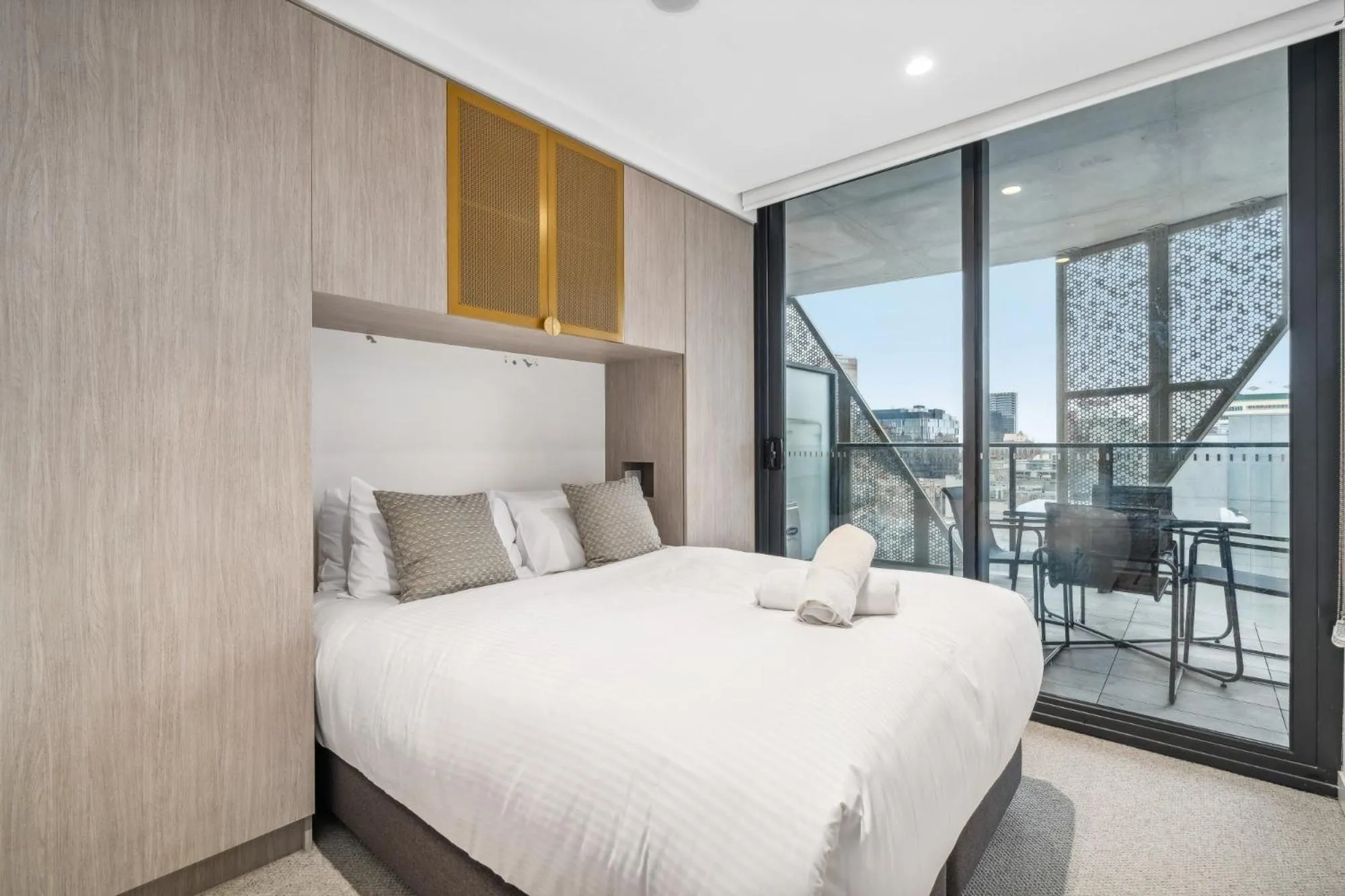 Bed in Realm Apartments by CLLIX