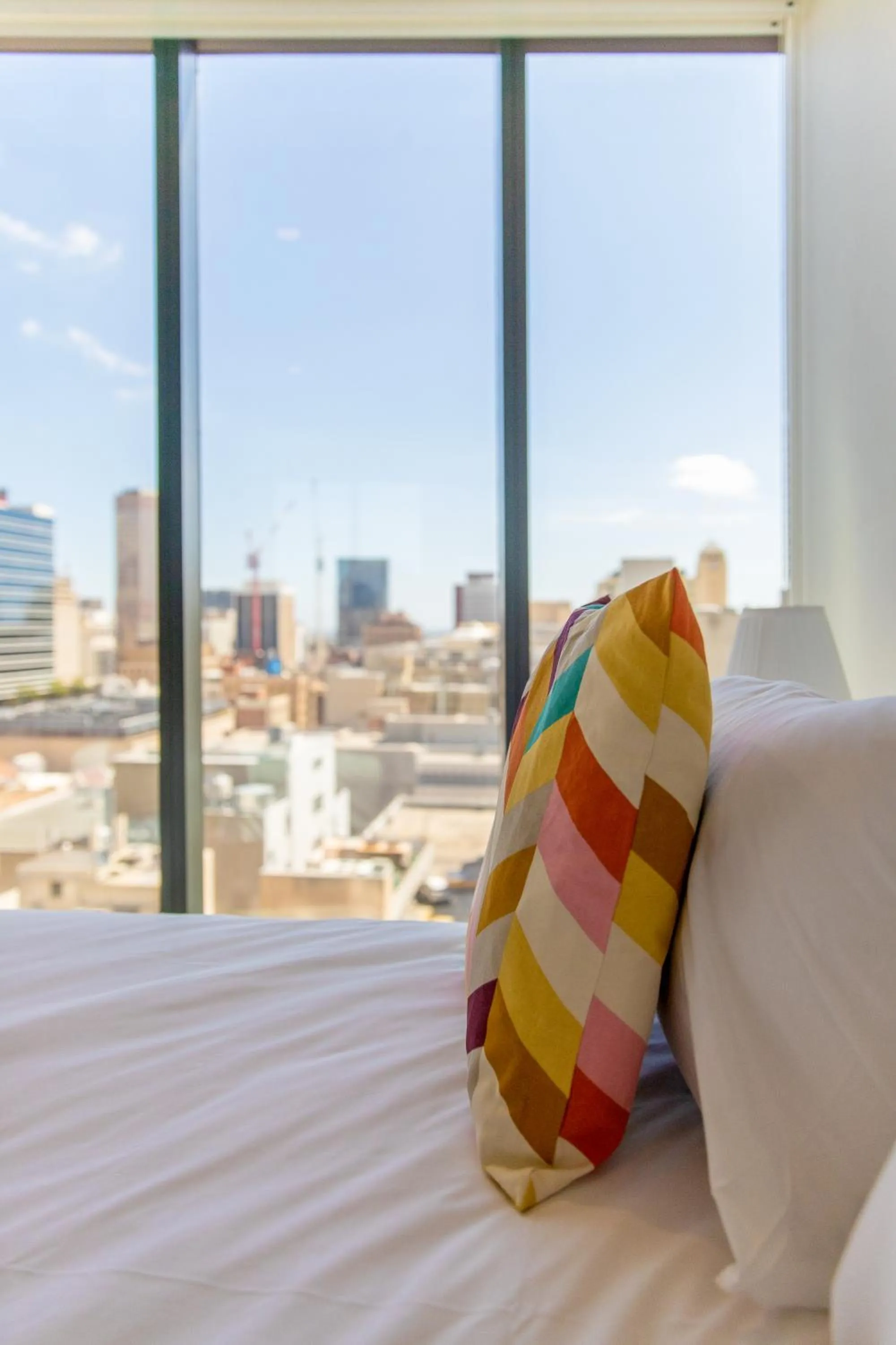 Bed in Realm Apartments by CLLIX