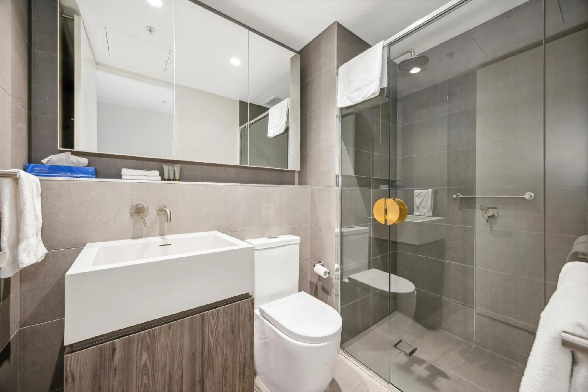 Shower in Realm Apartments by CLLIX