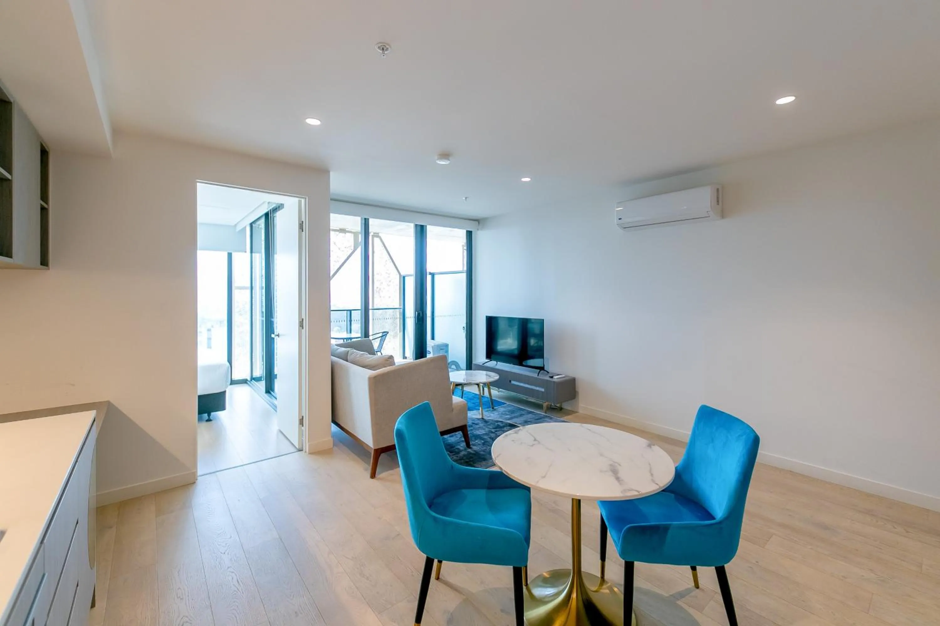 Dining area in Realm Apartments by CLLIX