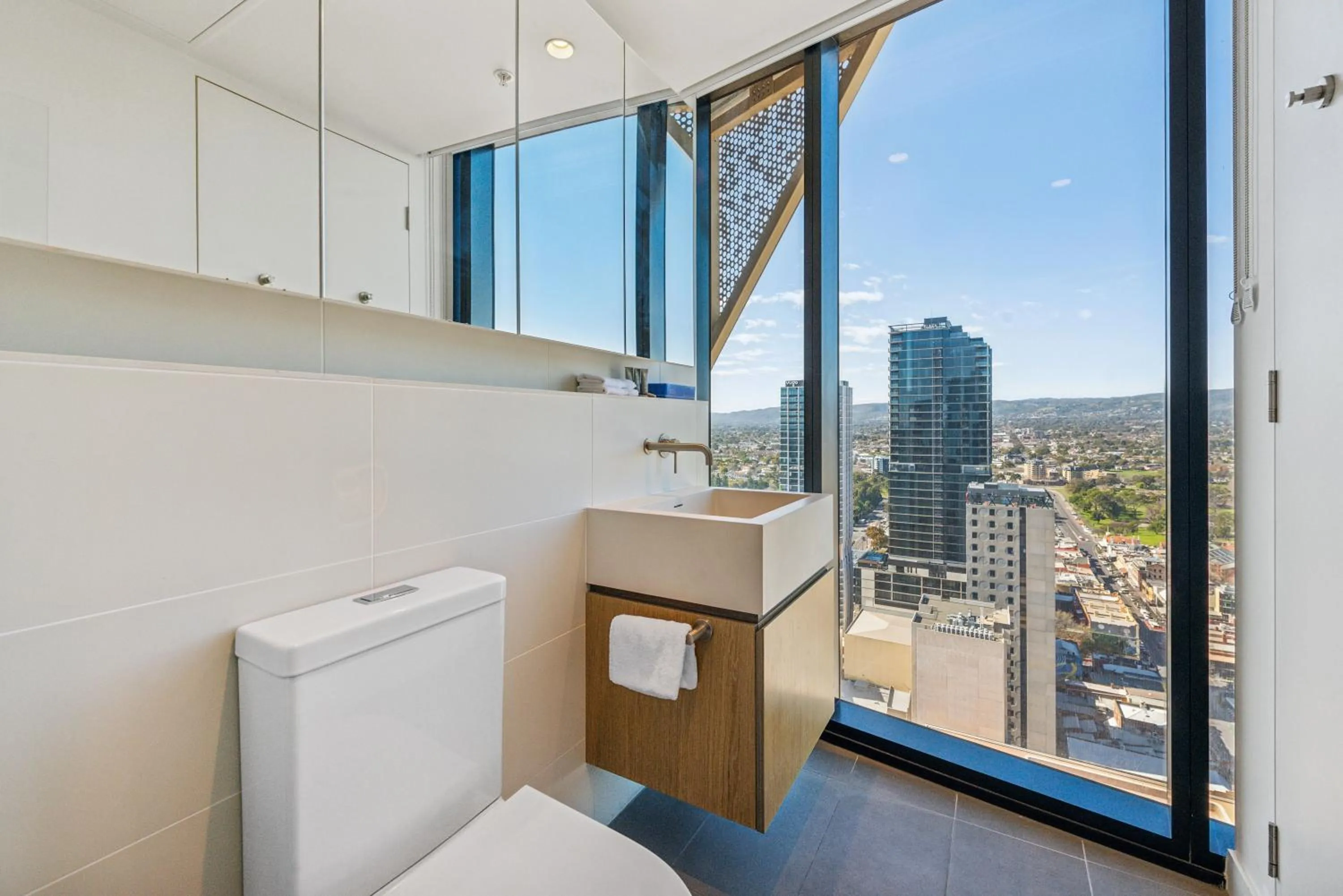 Bathroom in Realm Apartments by CLLIX