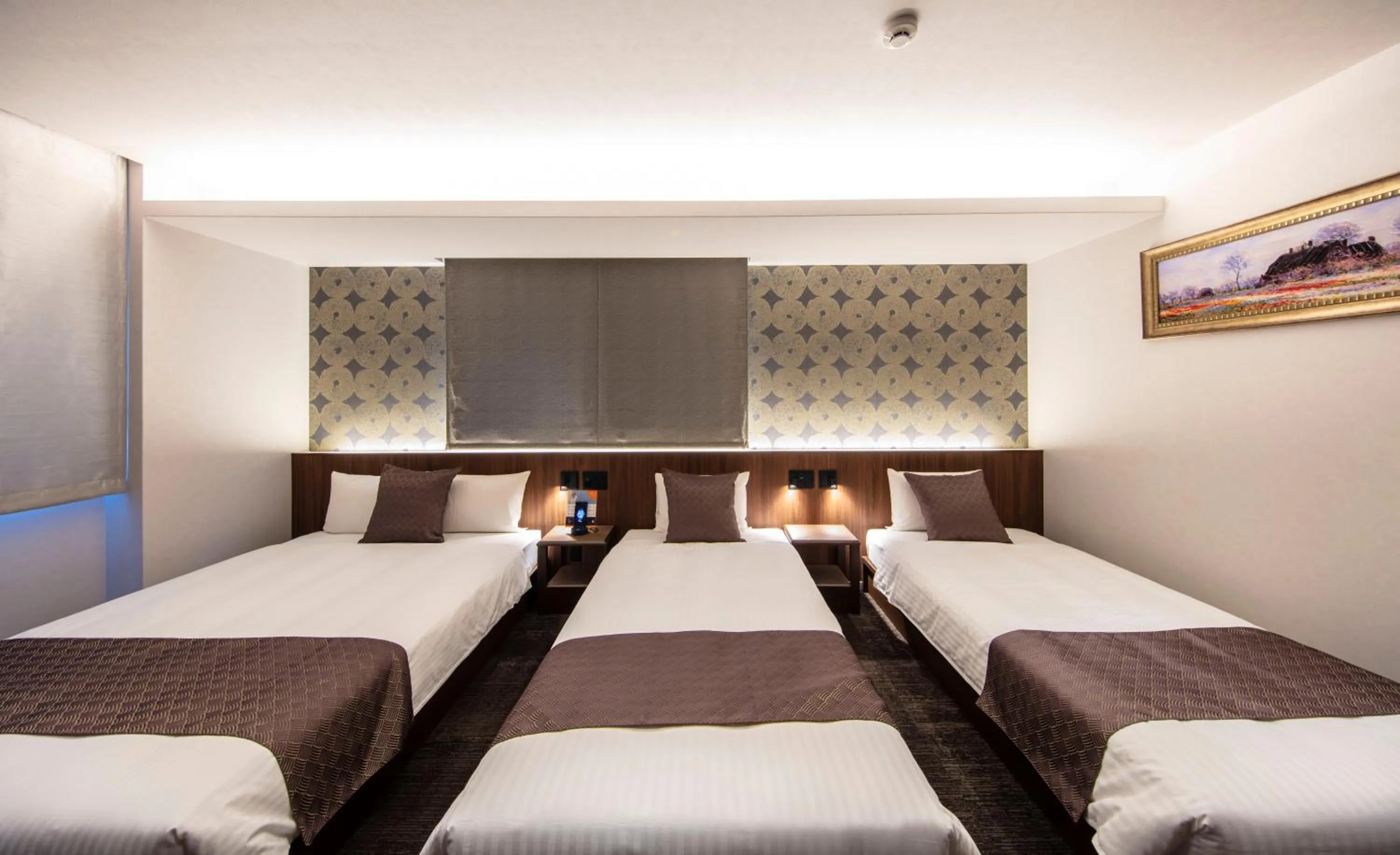 Bed in GRAND BASE Okayama Ekimae