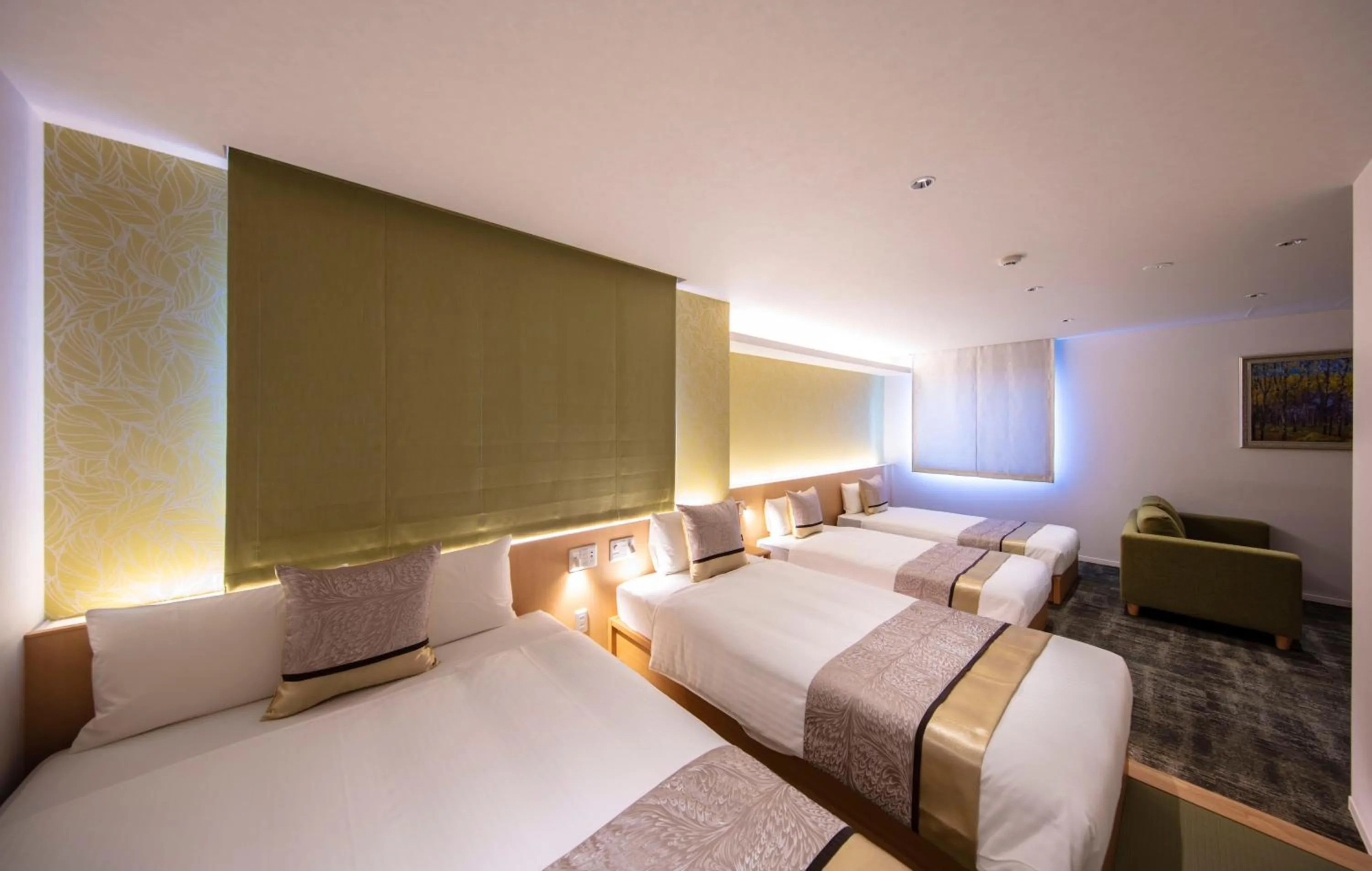 Bed in GRAND BASE Okayama Ekimae