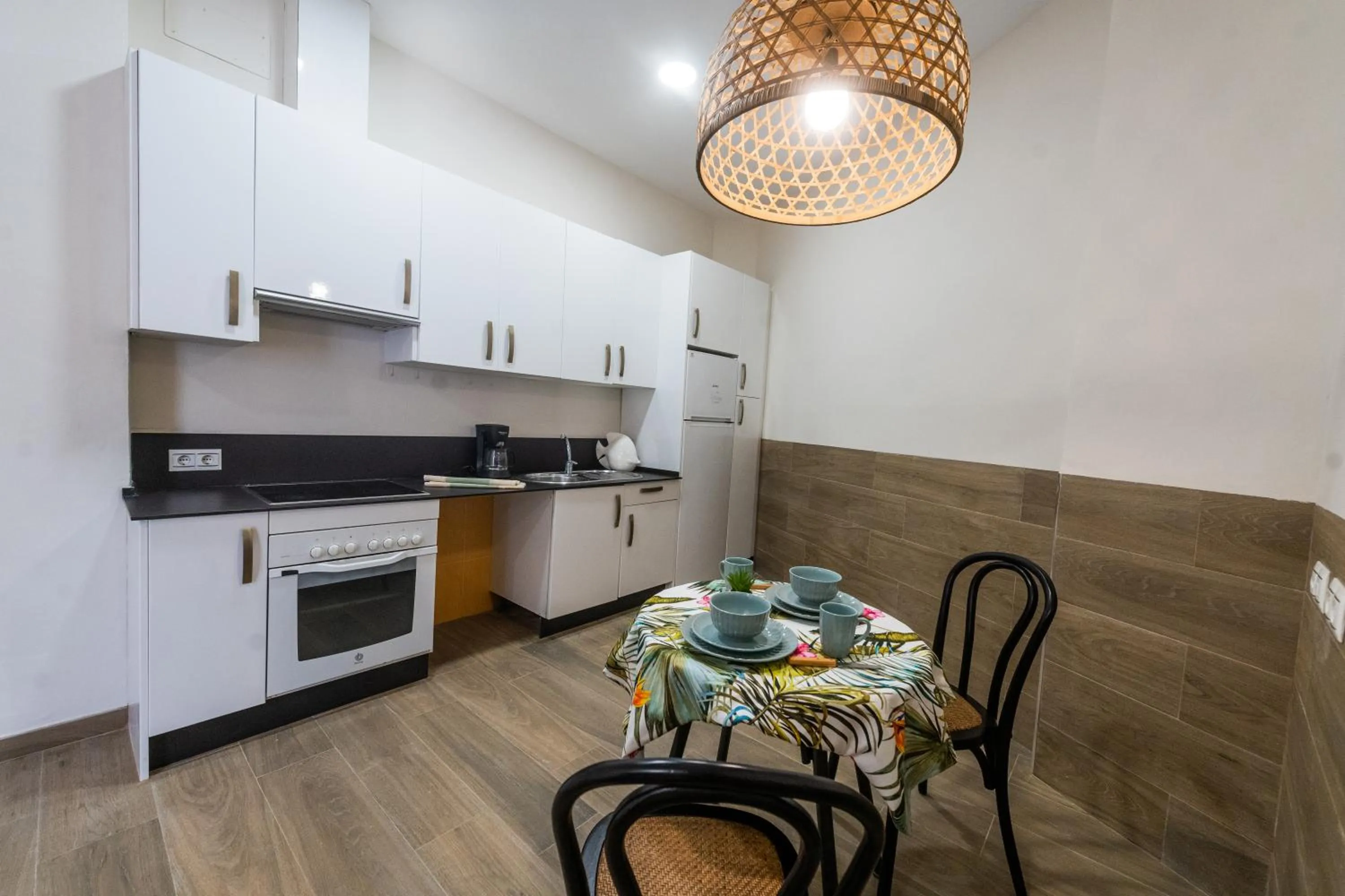 Kitchen or kitchenette in Suites La Merced