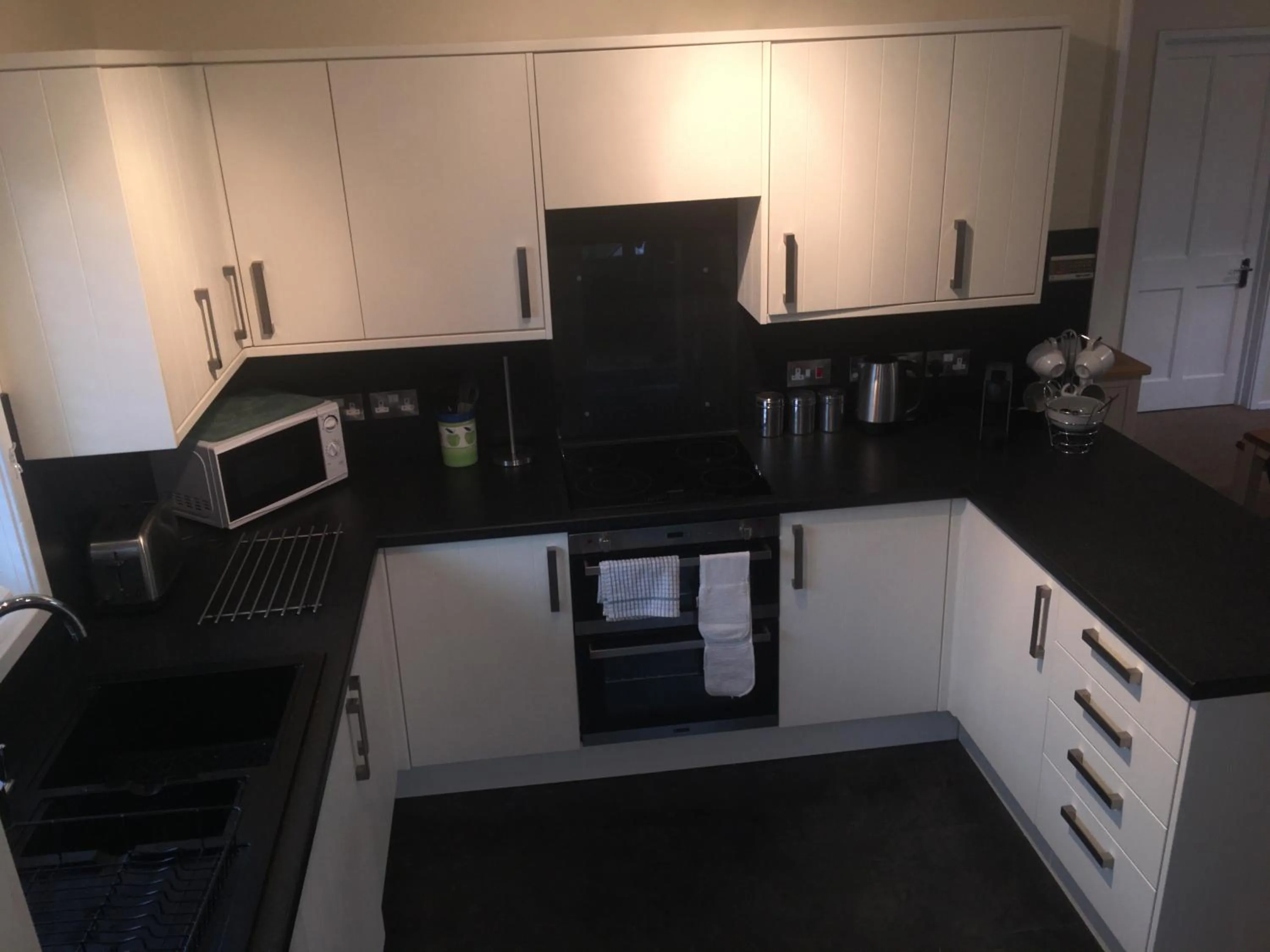 Kitchen or kitchenette in Keer Side Lodge, Luxury lodge with private hot tub at Pine Lake Resort