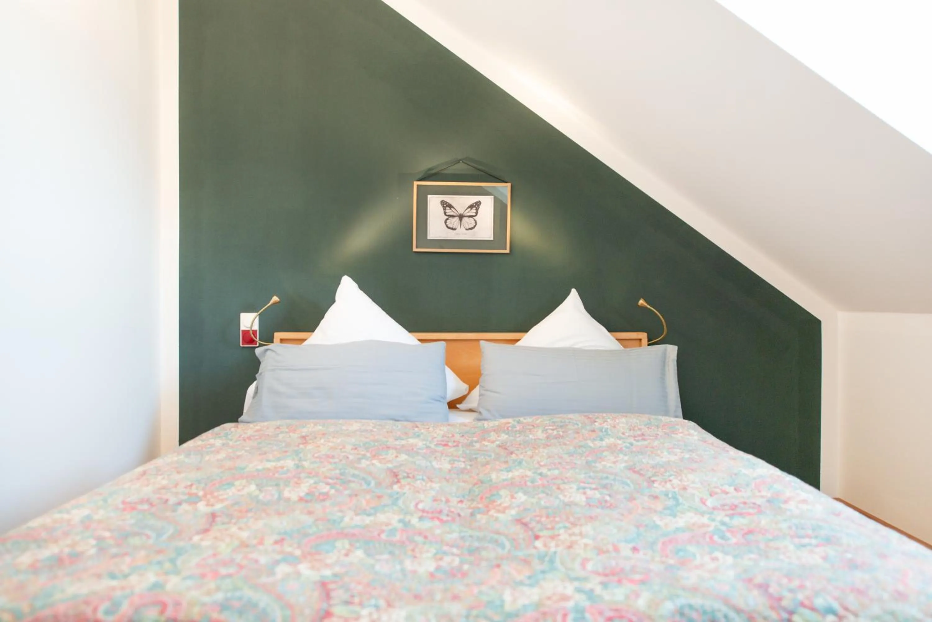 Bed in Biohotel Schlossgut Oberambach