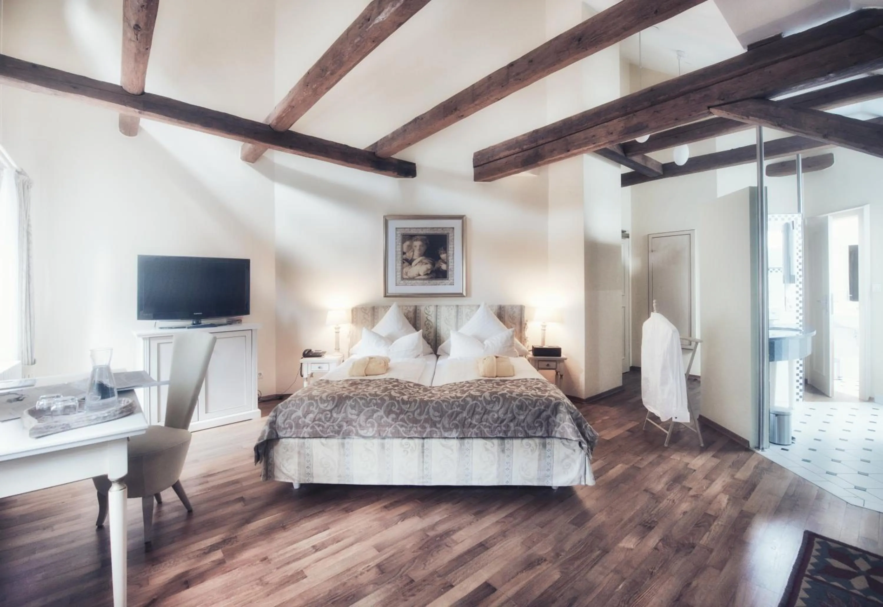 Bed in Biohotel Schlossgut Oberambach