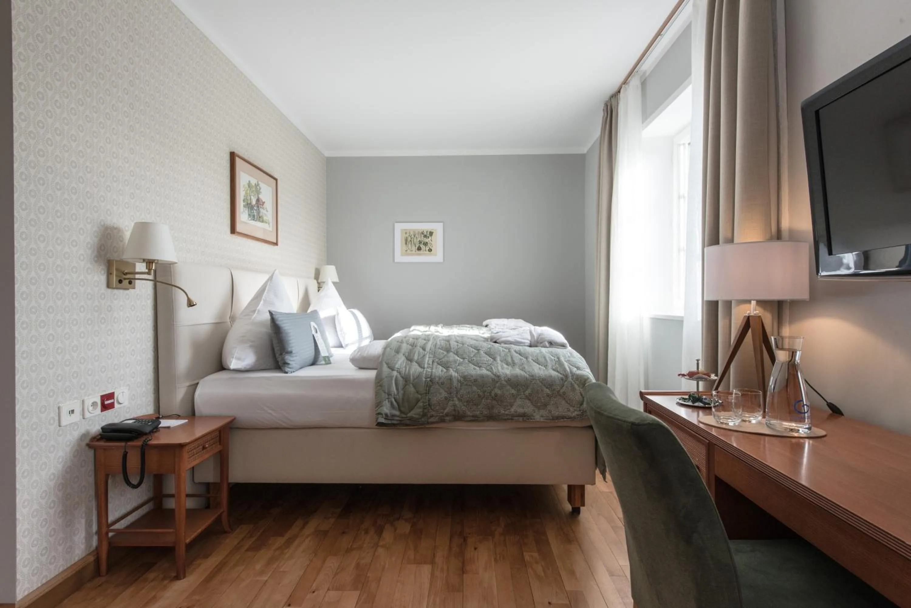 Bed in Biohotel Schlossgut Oberambach