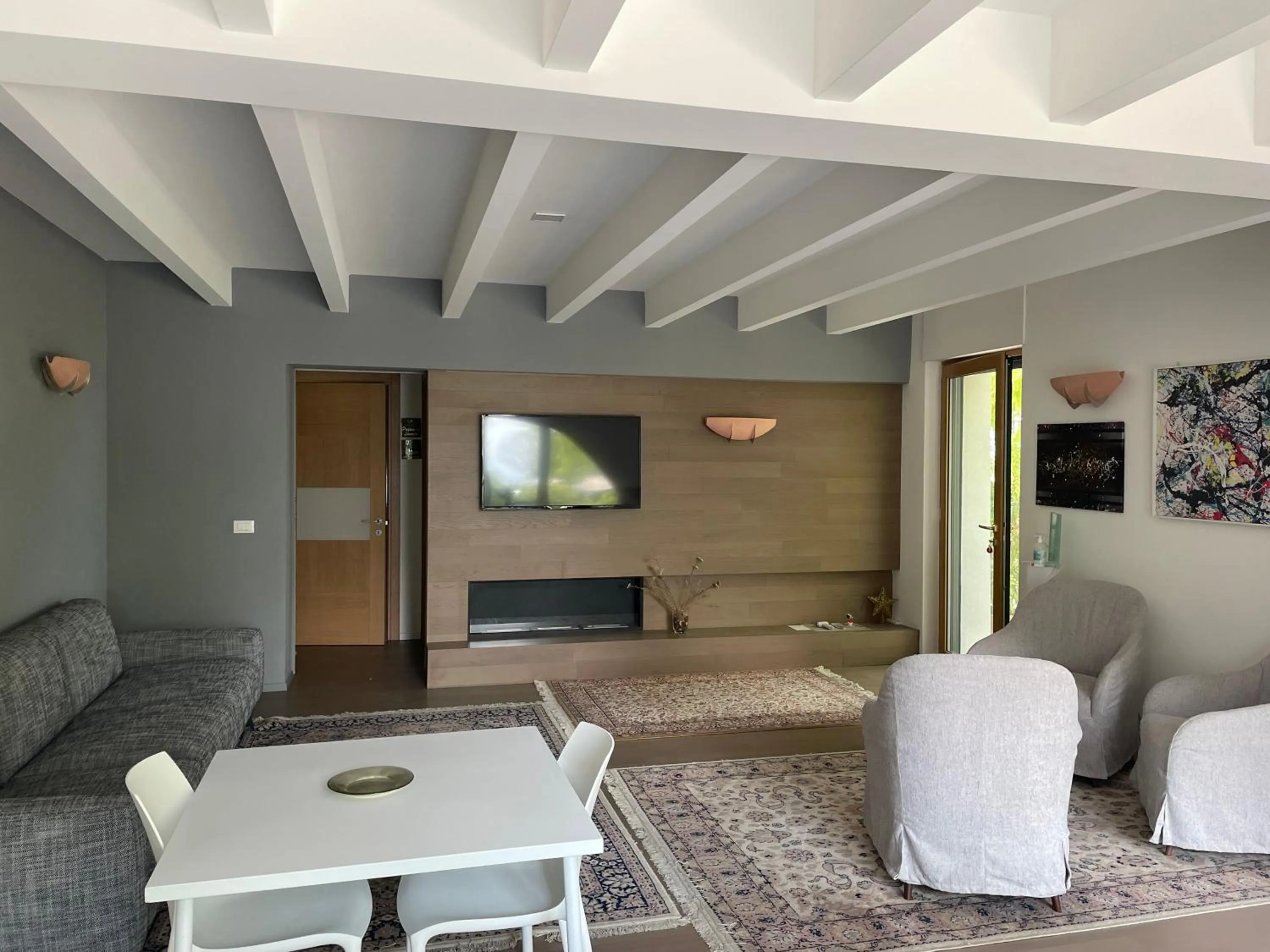 Communal lounge/ TV room in La Casa nel Verde