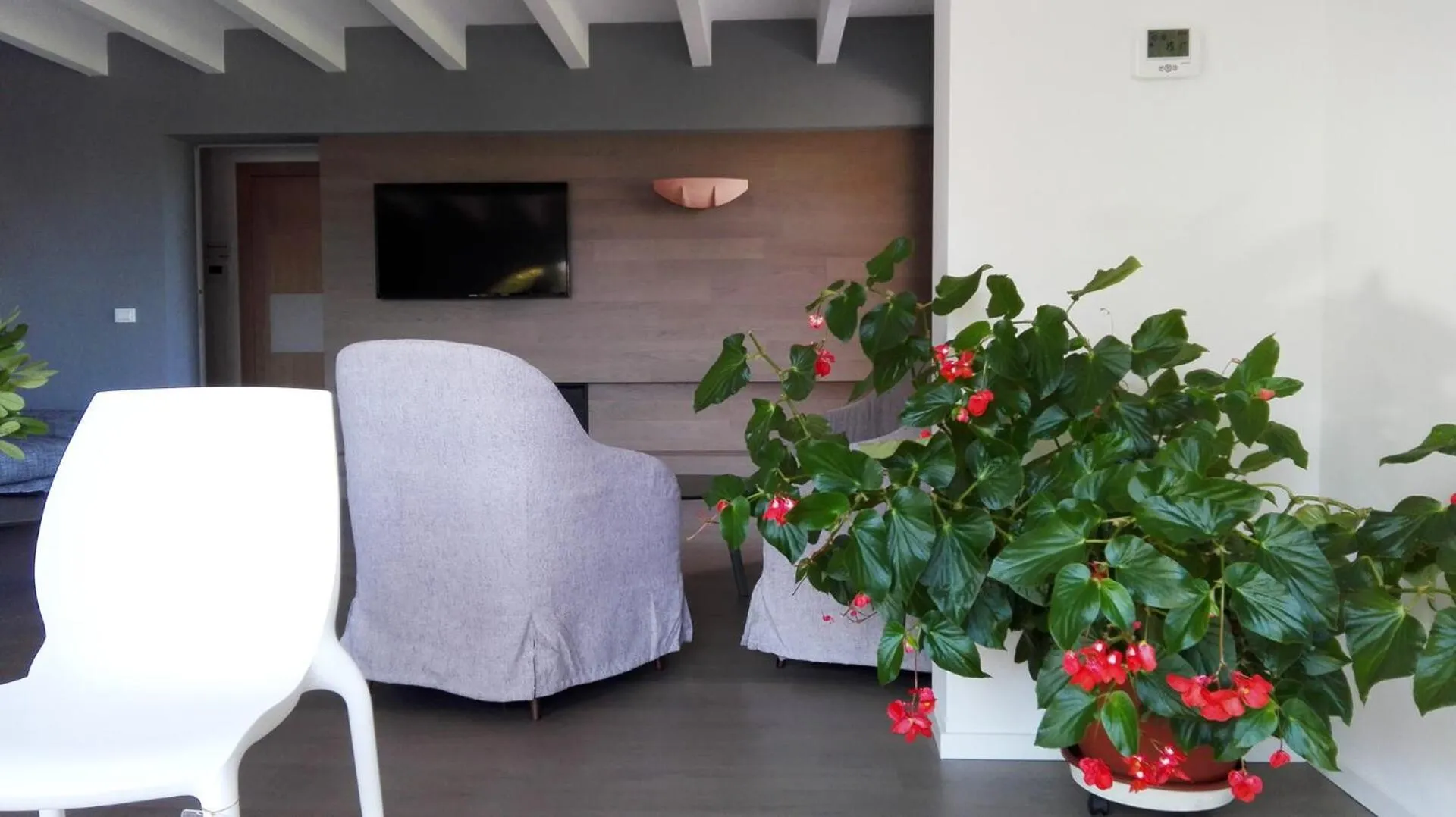 Communal lounge/ TV room, Bed in La Casa nel Verde