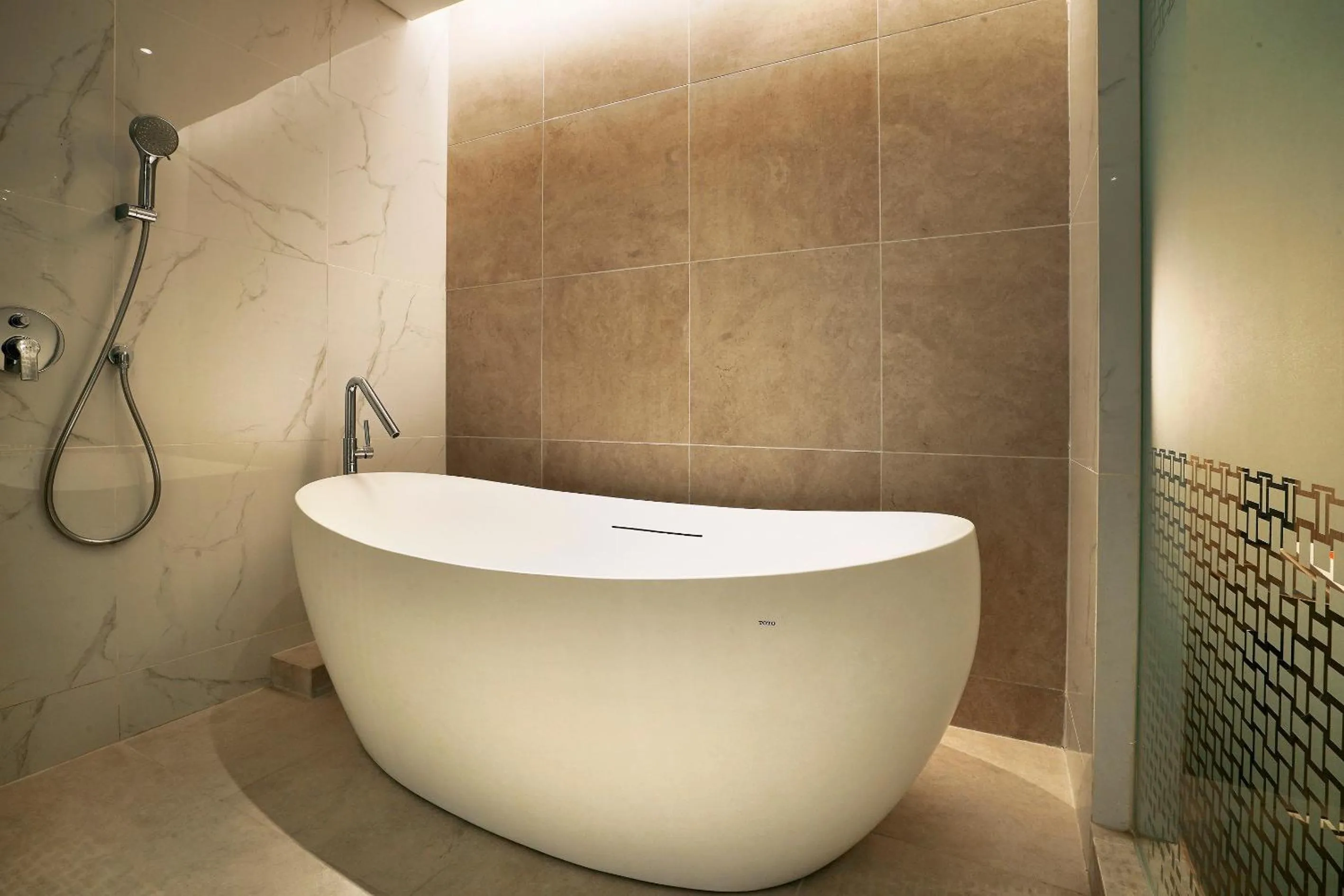 Bathroom in Harris Suites Puri Mansion