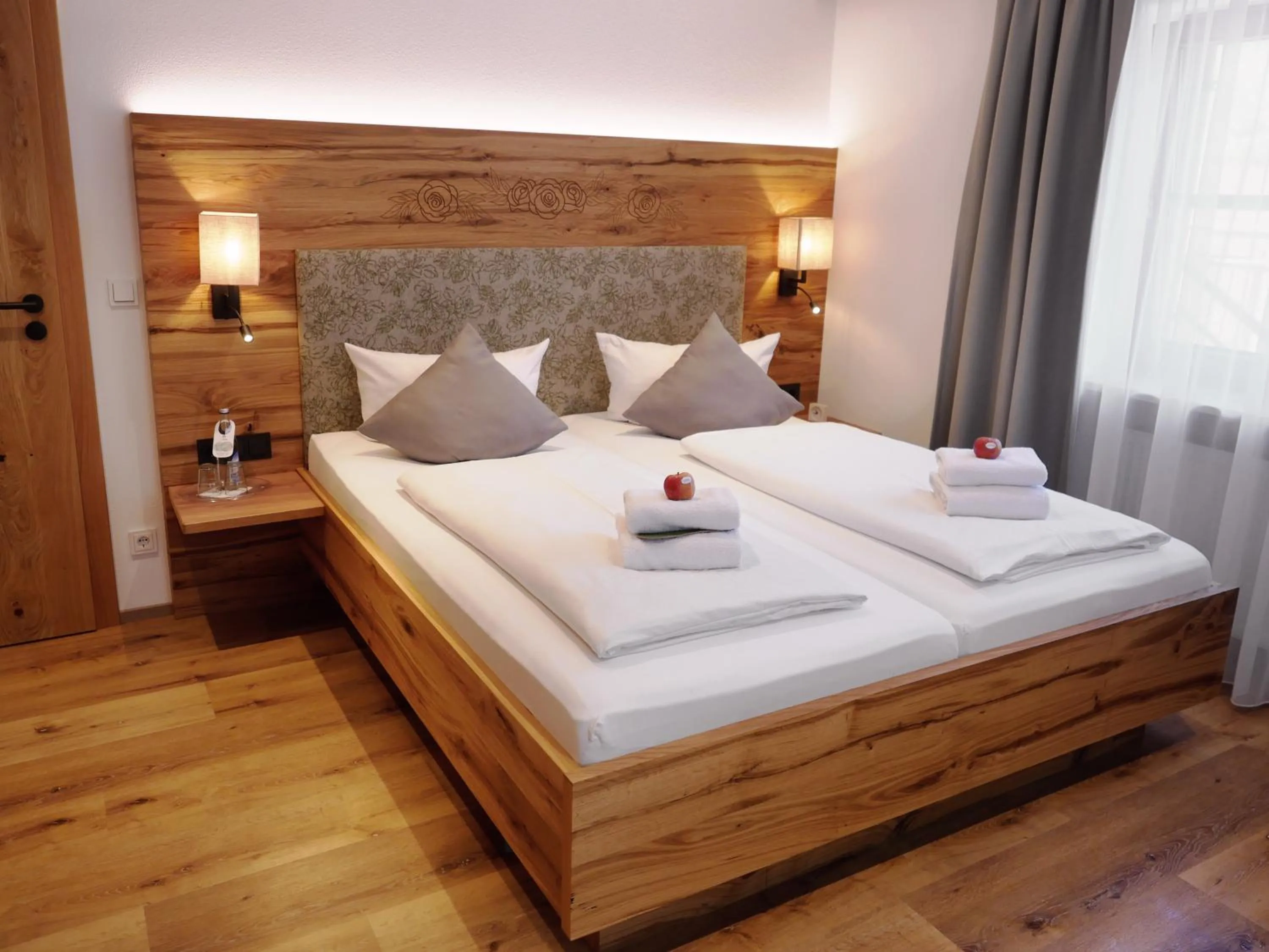 Bed in DEVA Hotel Alpenglück