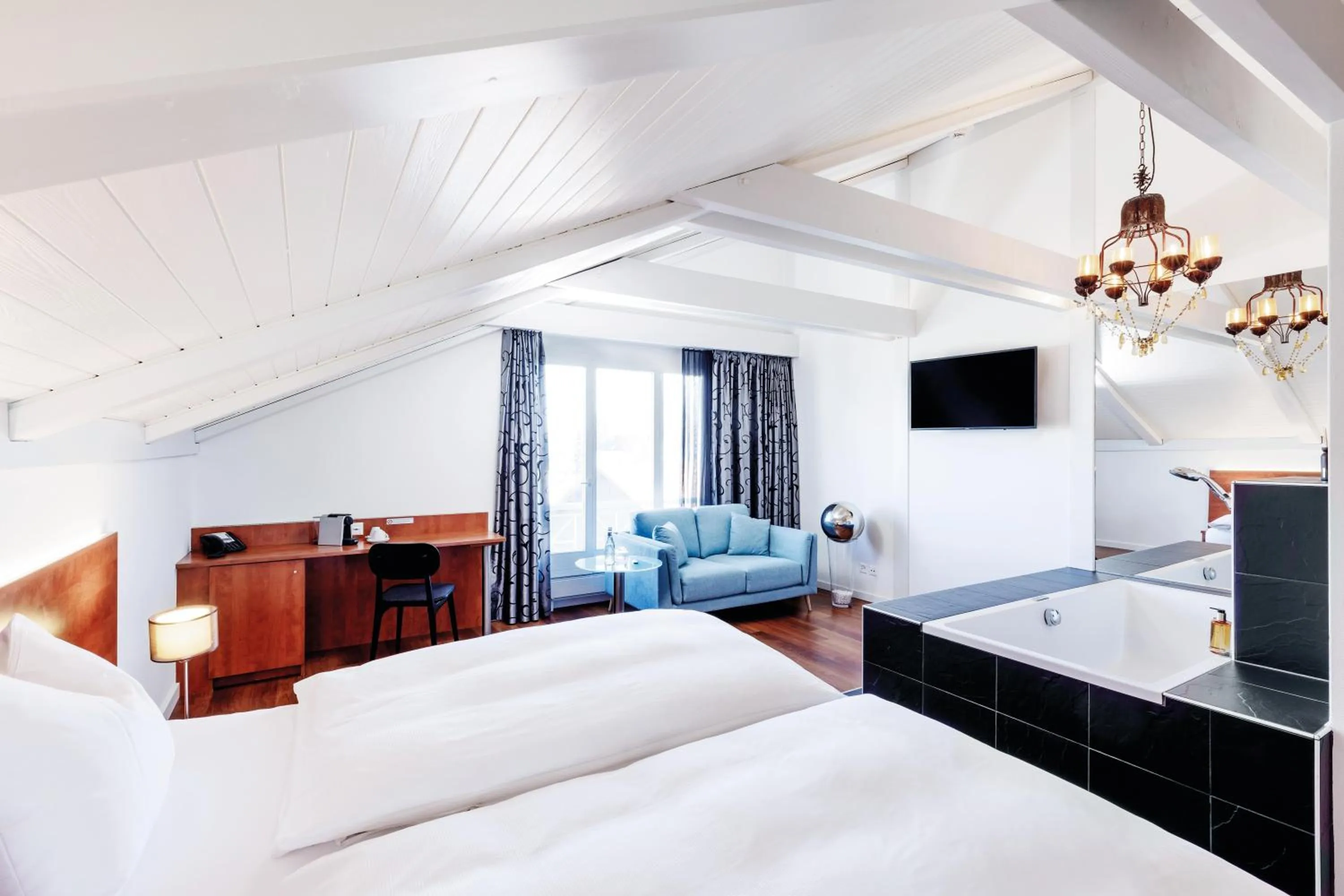 Photo of the whole room, Bed in Sorell Hotel Sonnental Dübendorf