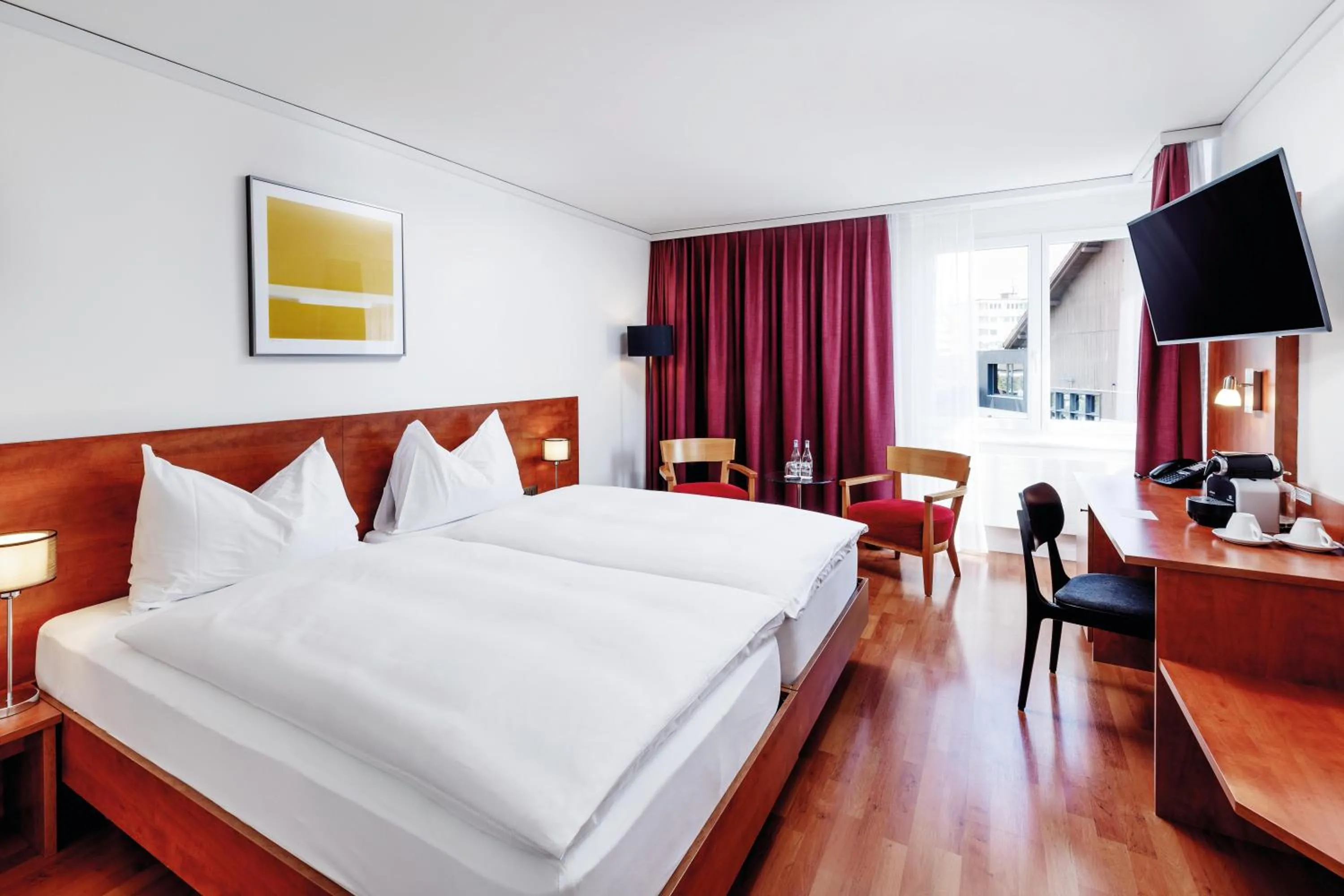 Photo of the whole room, Bed in Sorell Hotel Sonnental Dübendorf