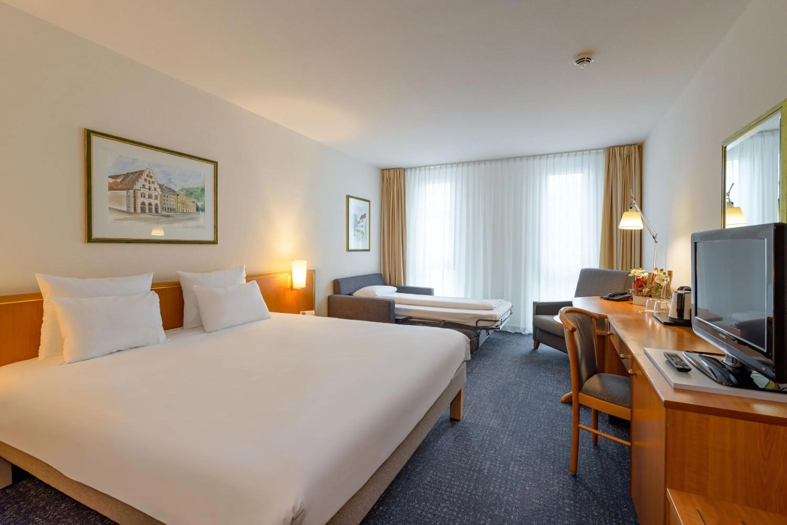 Bed in Novotel Freiburg am Konzerthaus