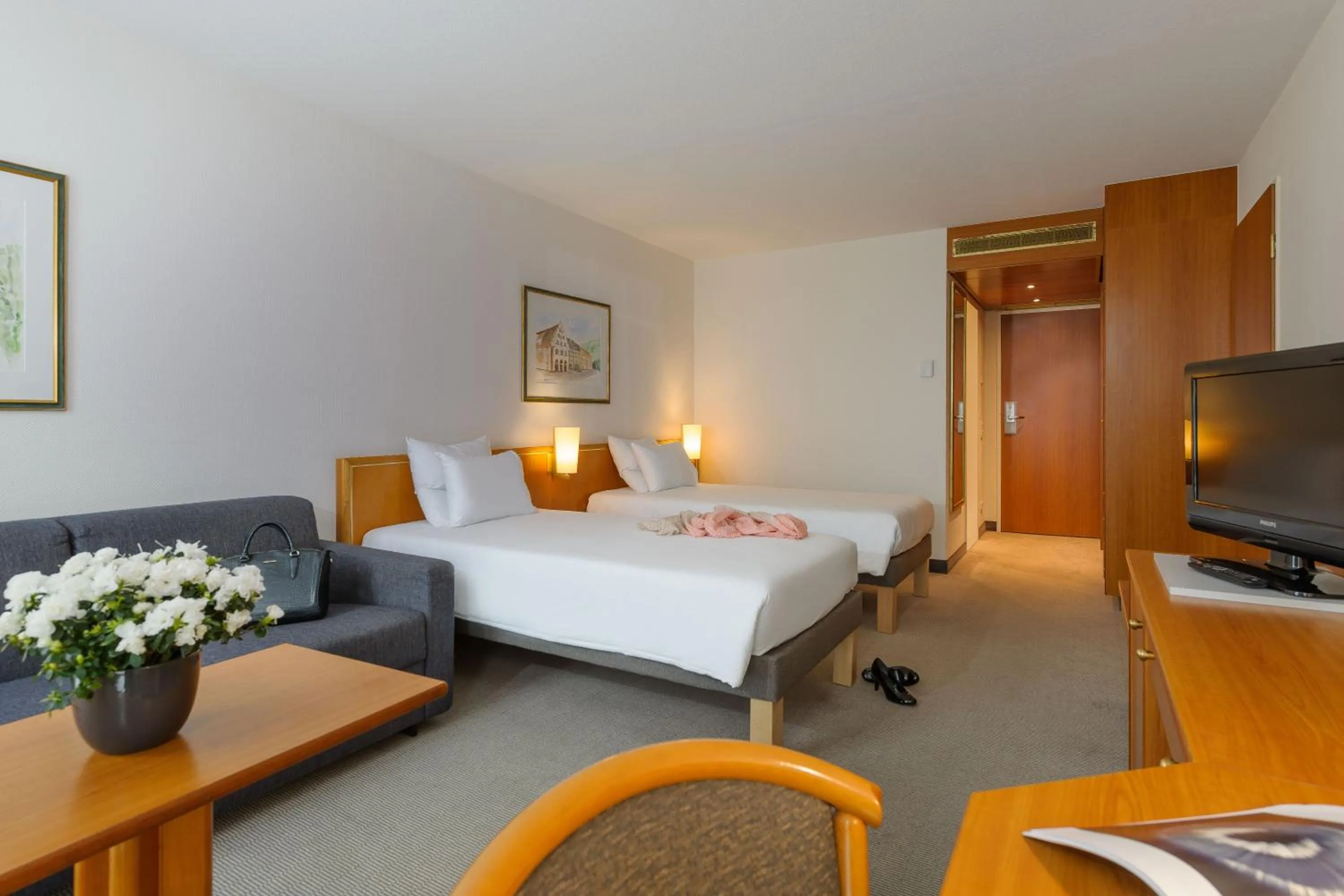 Photo of the whole room, Bed in Novotel Freiburg am Konzerthaus