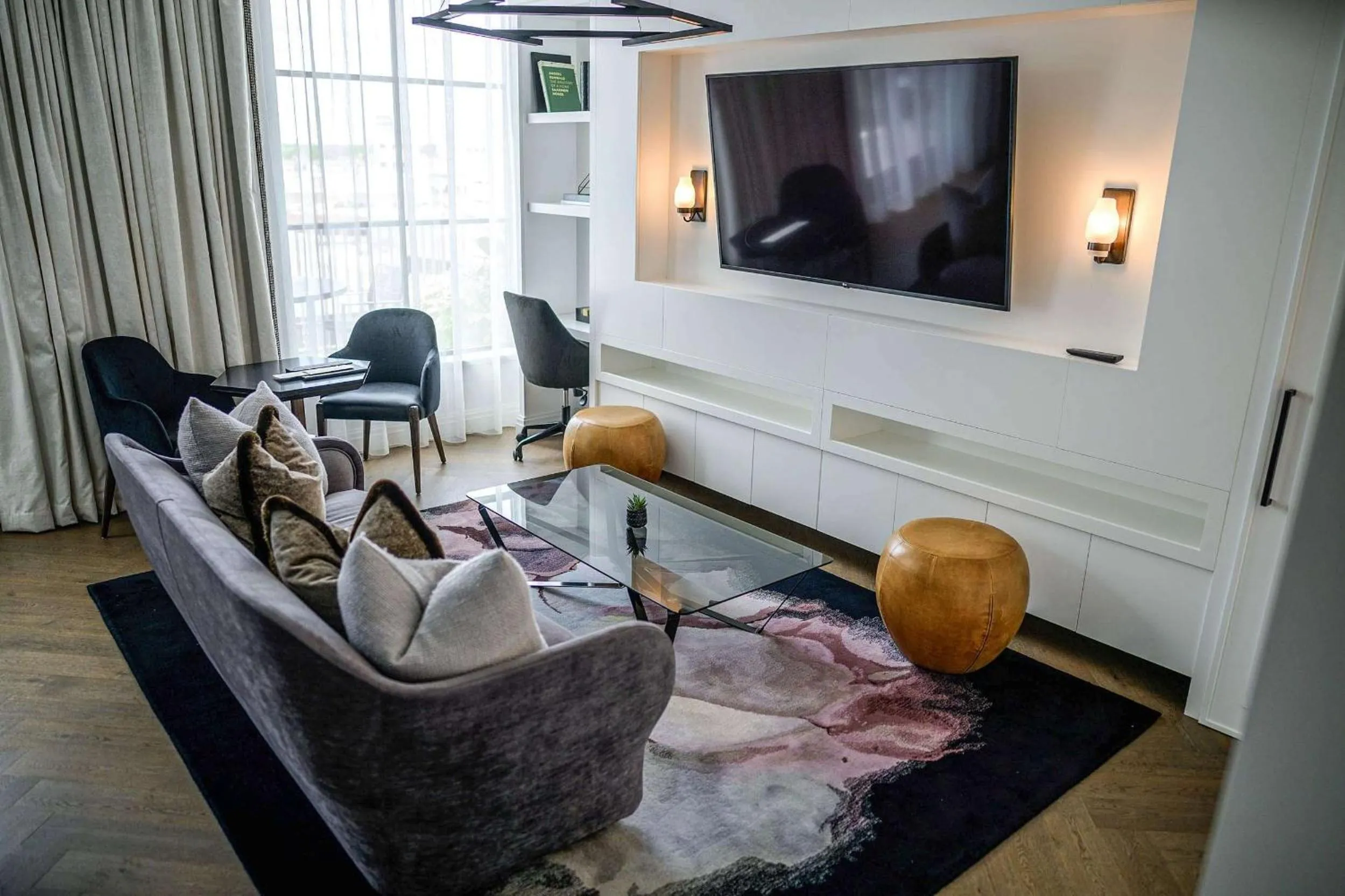 Living room in Daxton Hotel Birmingham, Curio Collection by Hilton