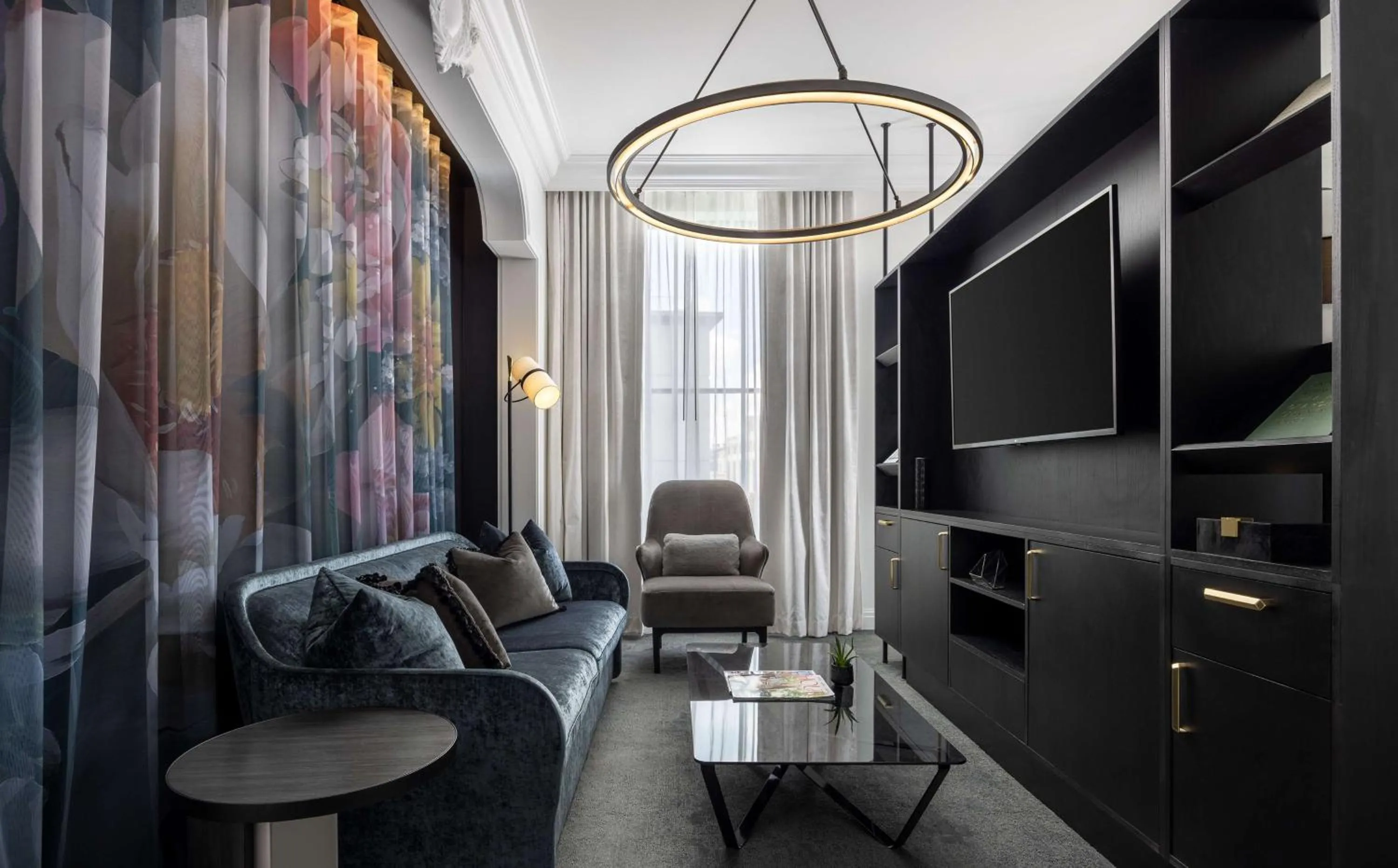 Living room in Daxton Hotel Birmingham, Curio Collection by Hilton