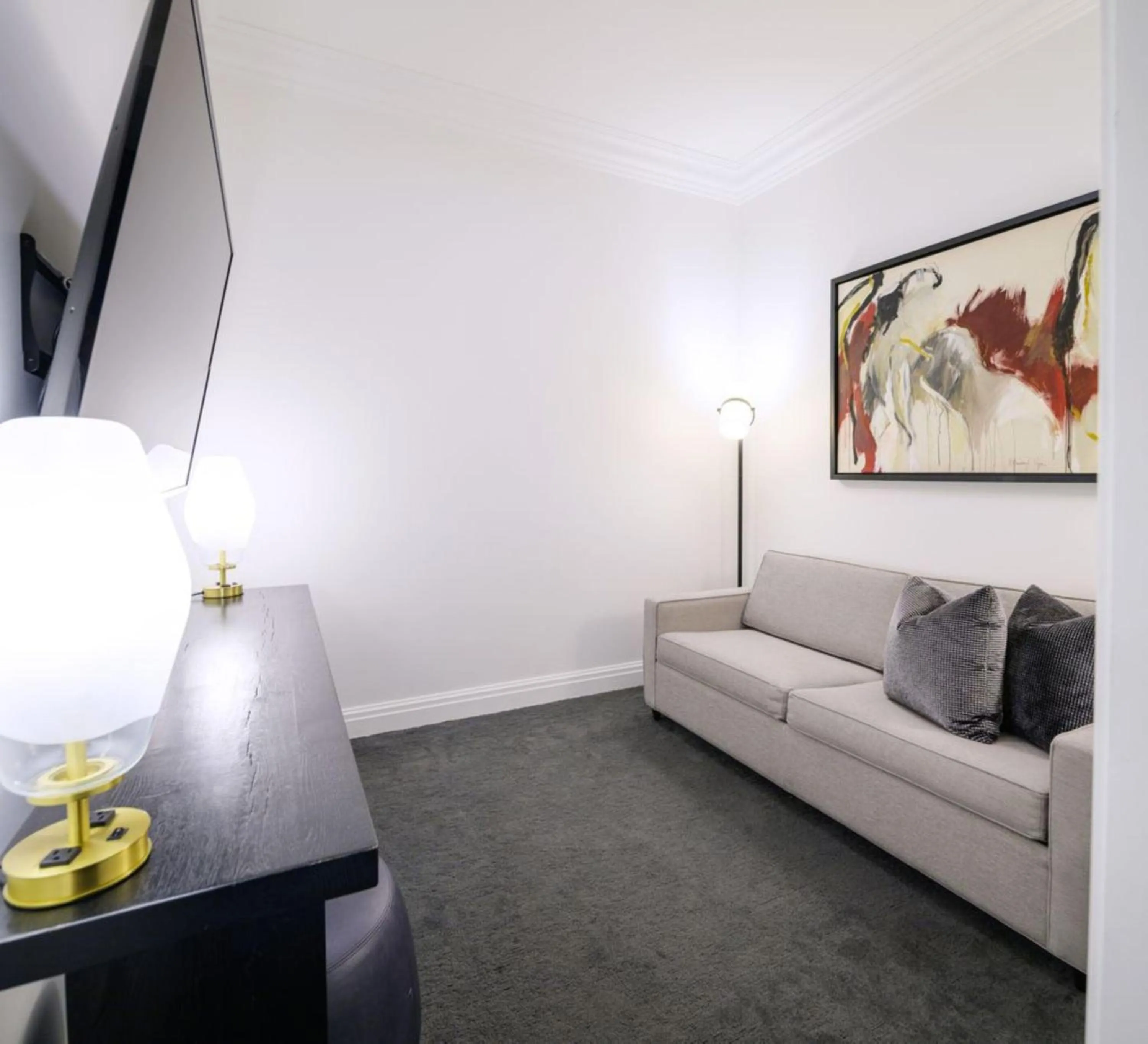 Living room in Daxton Hotel Birmingham, Curio Collection by Hilton