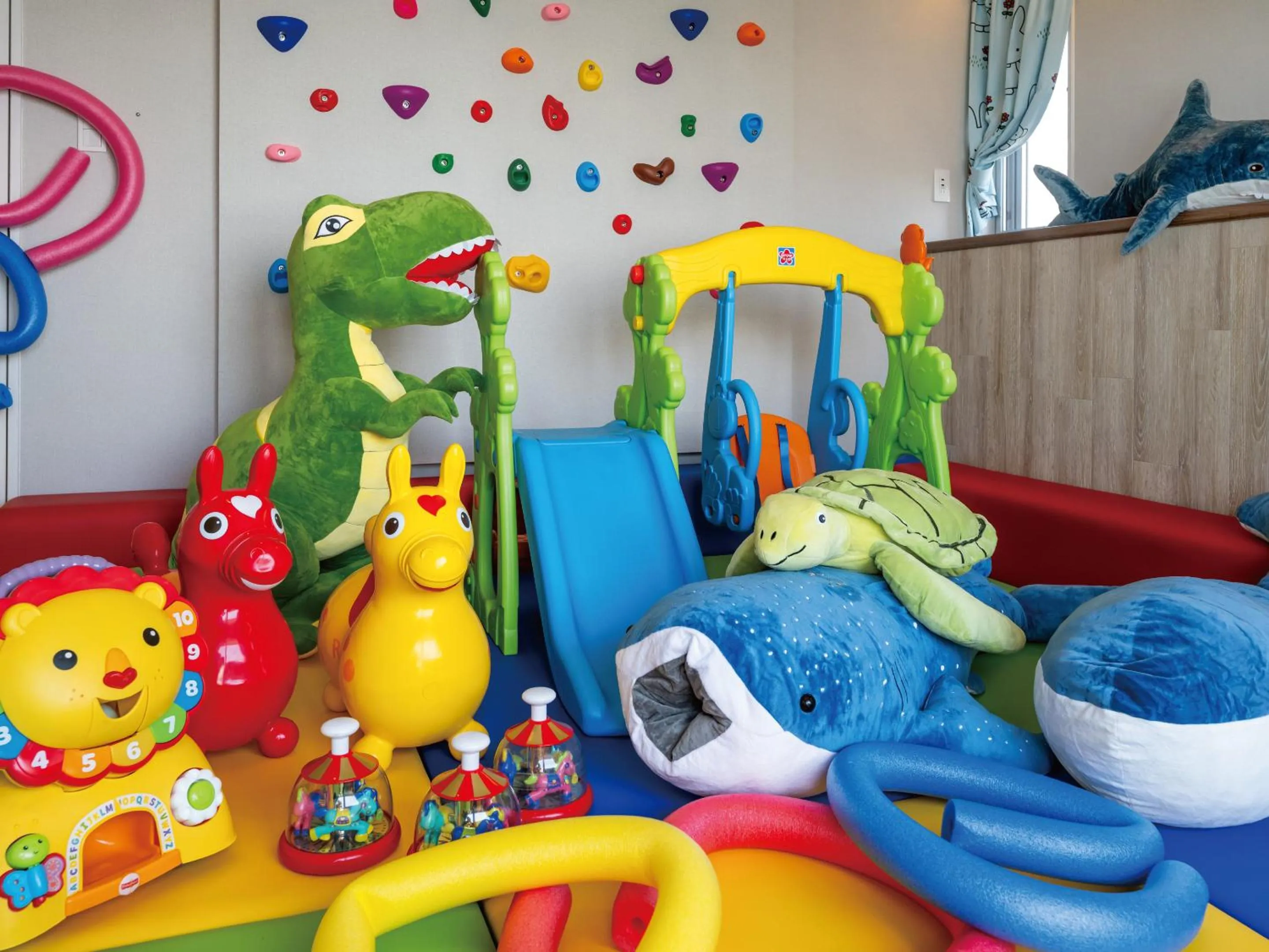 Photo of the whole room in Family Condo Chatan Hills by Coldio Premium