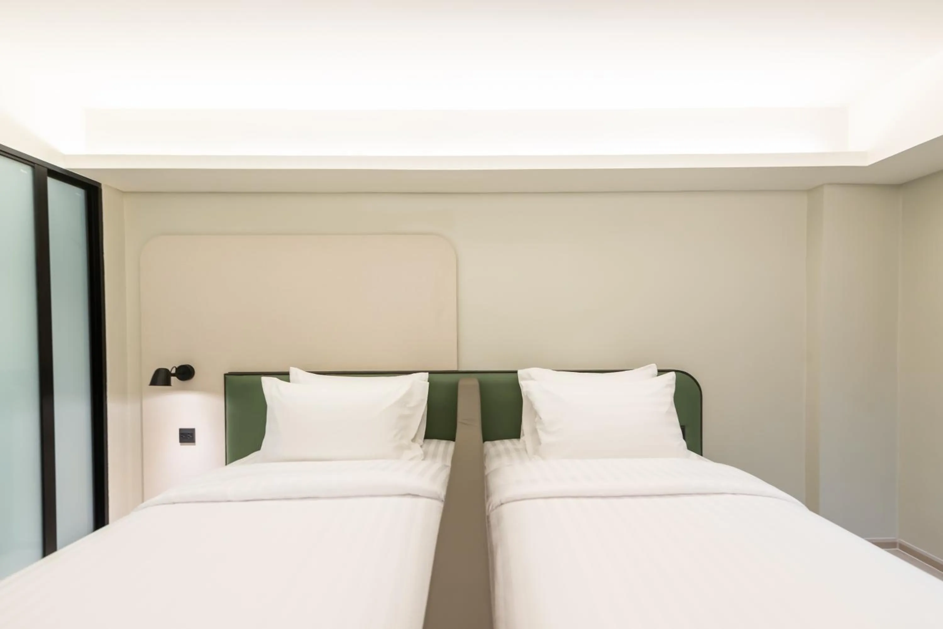 Bed in Kaya Heritage Hotel