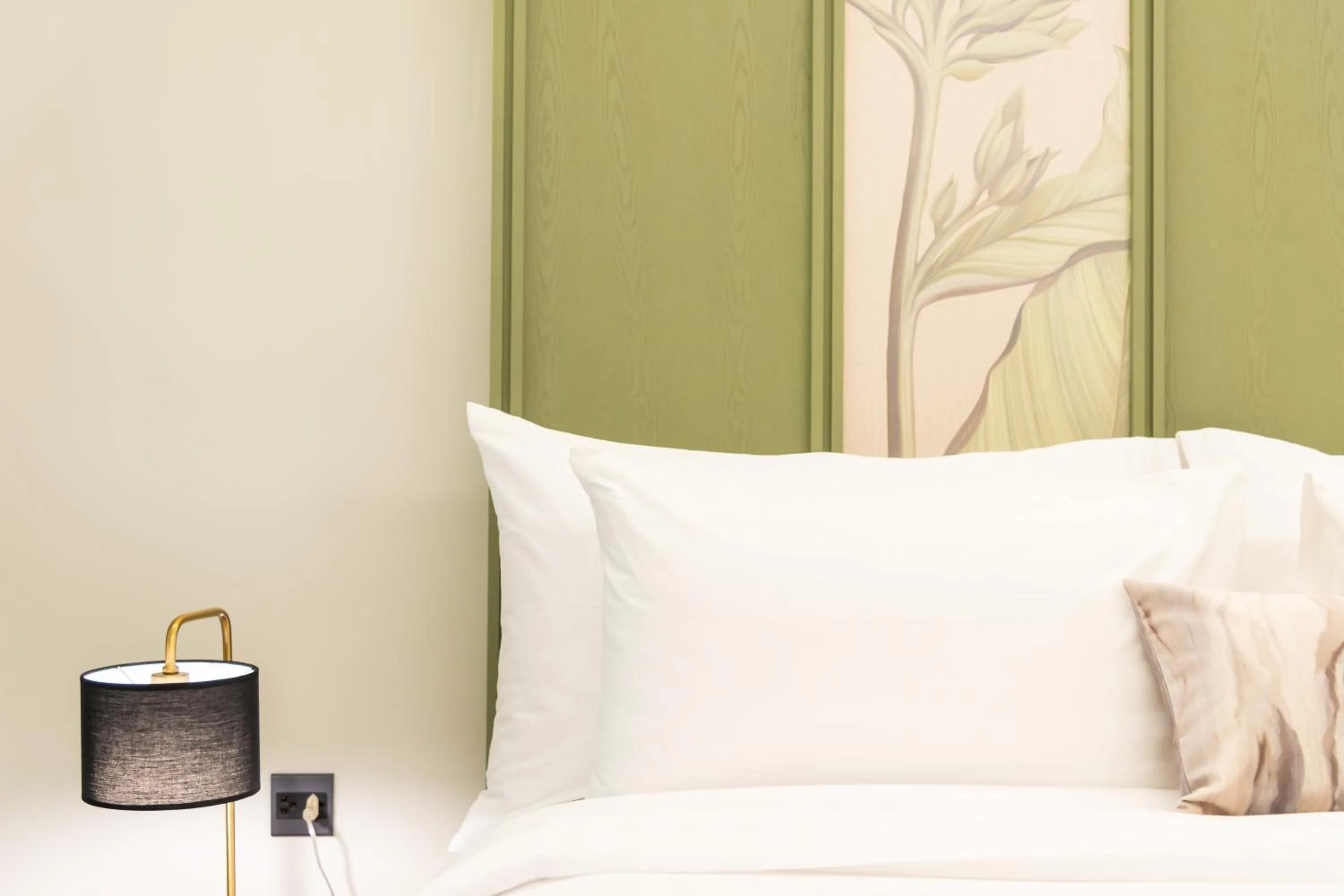 Bed in Kaya Heritage Hotel