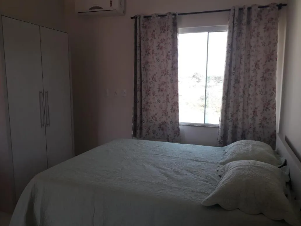 Bed in Pousada Maré Boa