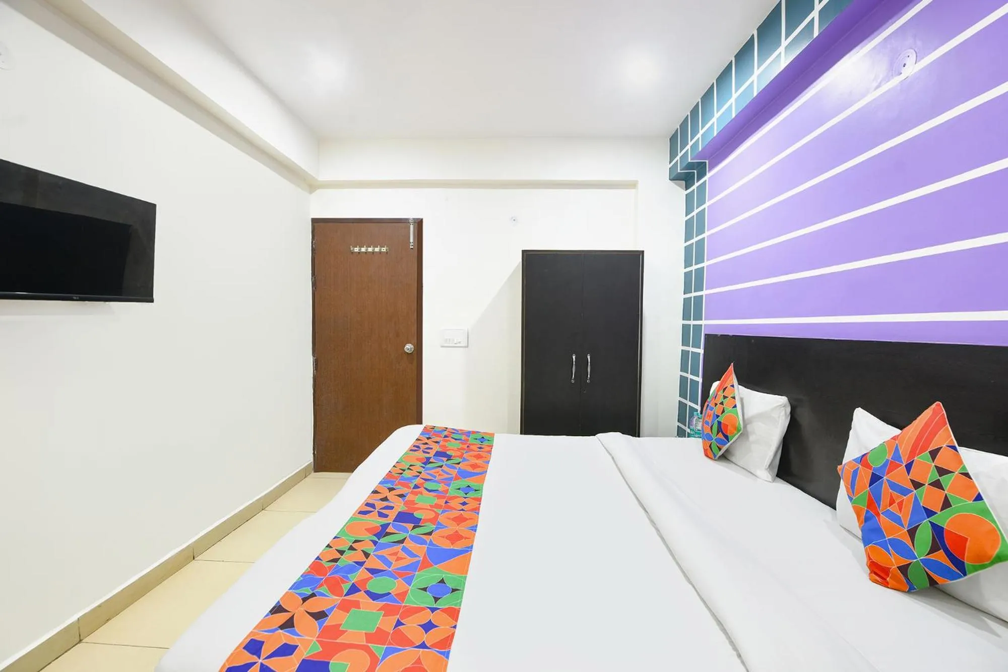 Bed in FabHotel Coco Tree