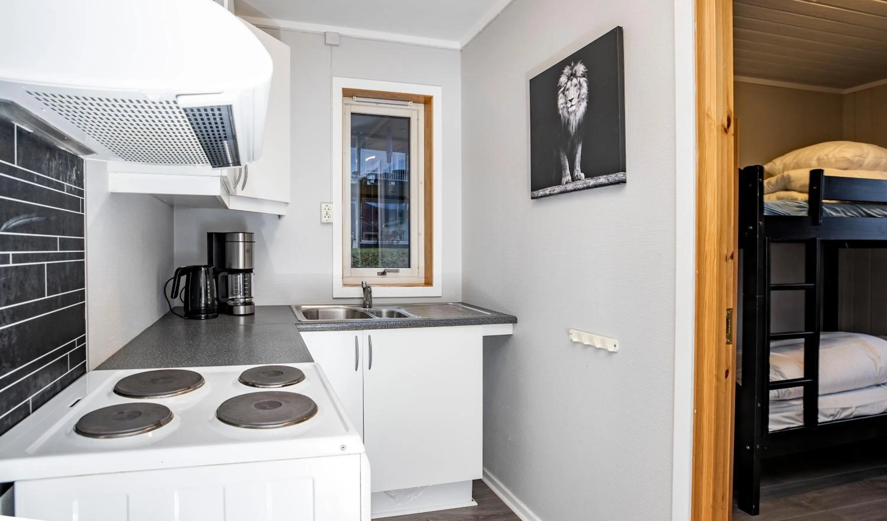 Kitchen or kitchenette, Bed in Lillehammer Camping