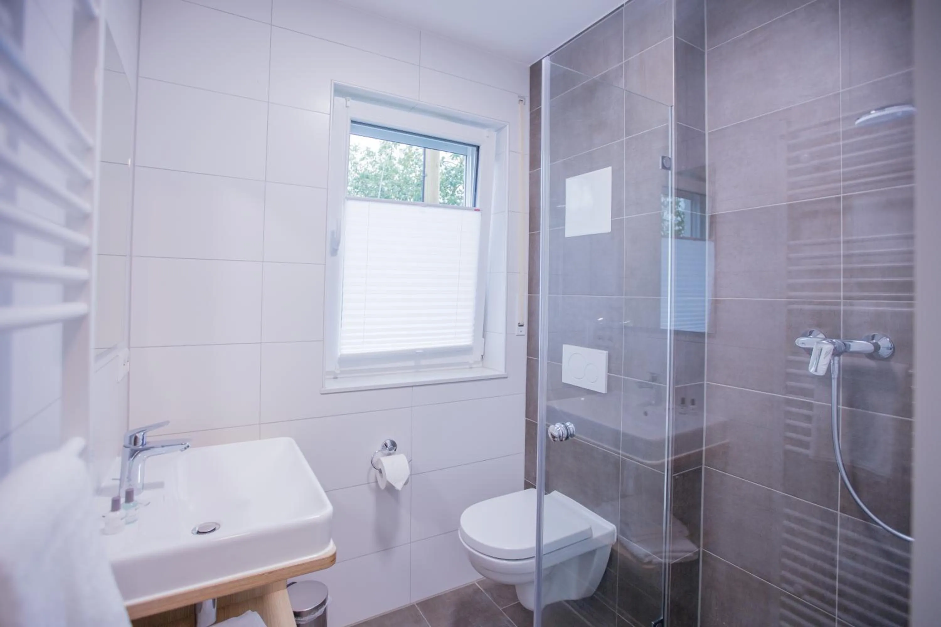 Bathroom in Schoko-Apartments mit Bad & Küche