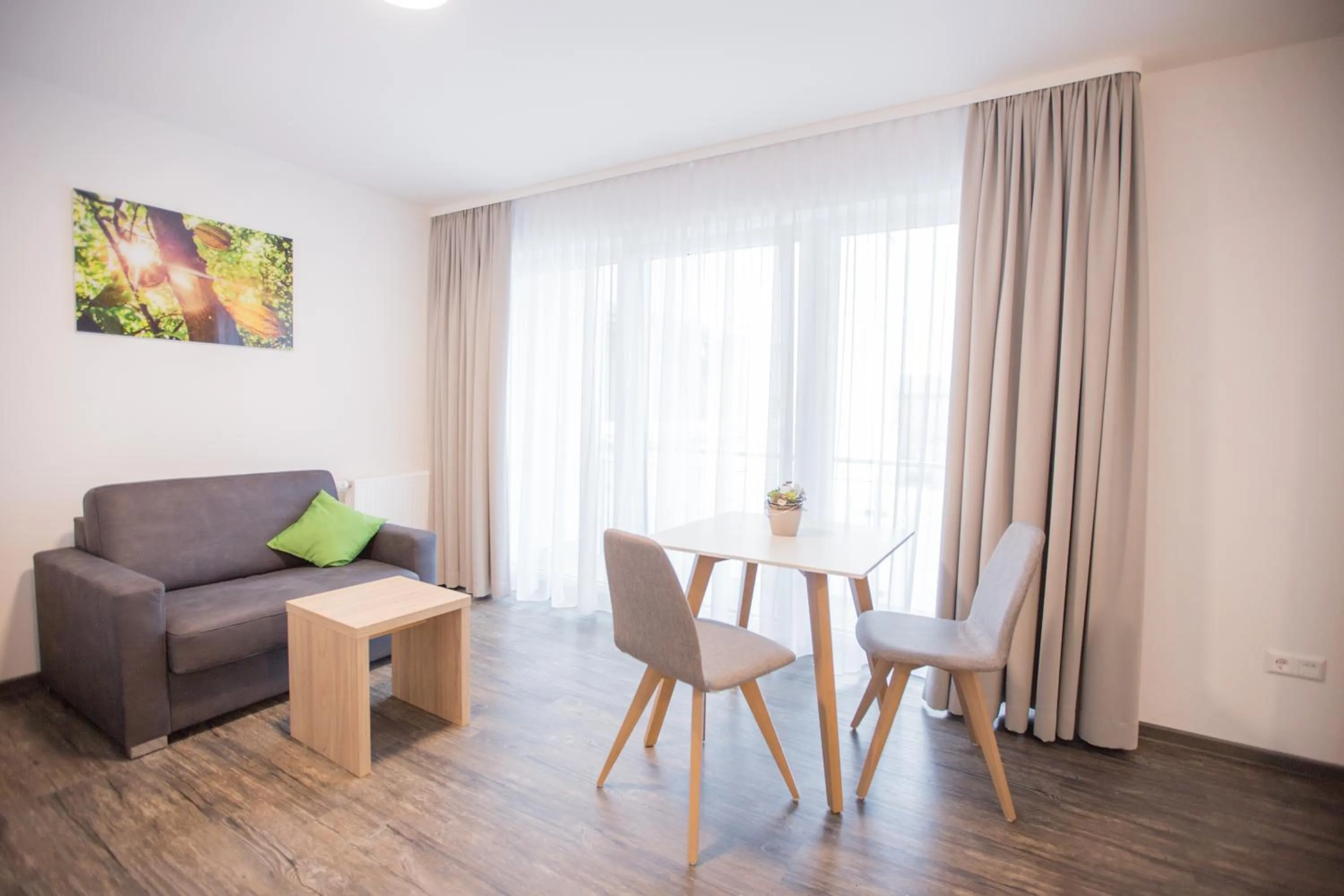 Photo of the whole room in Schoko-Apartments mit Bad & Küche